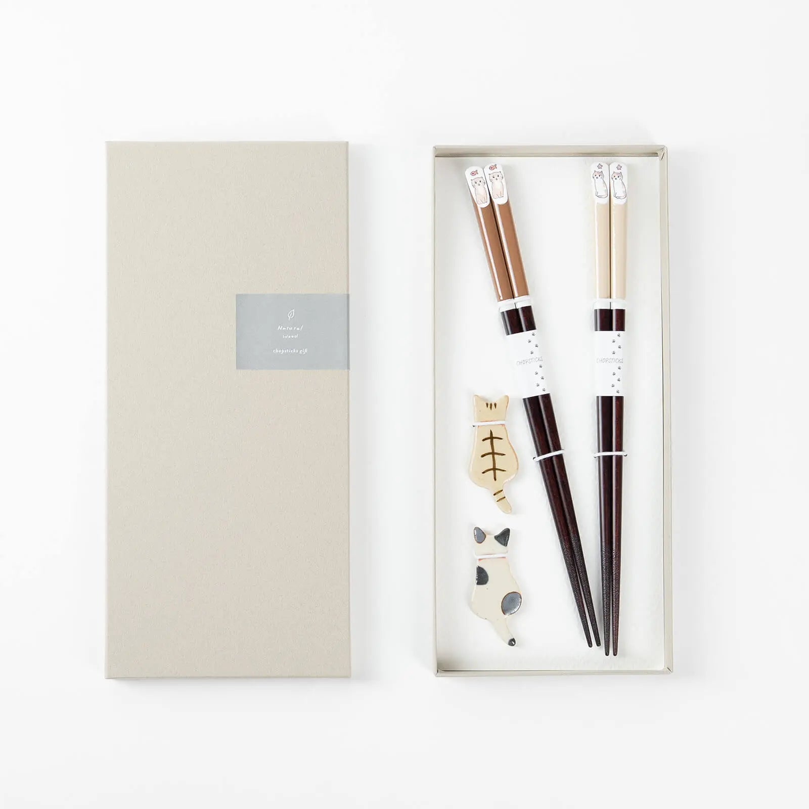 Cat couple chopsticks gift set in brown and beige, 23cm, with matching ceramic chopstick rests.