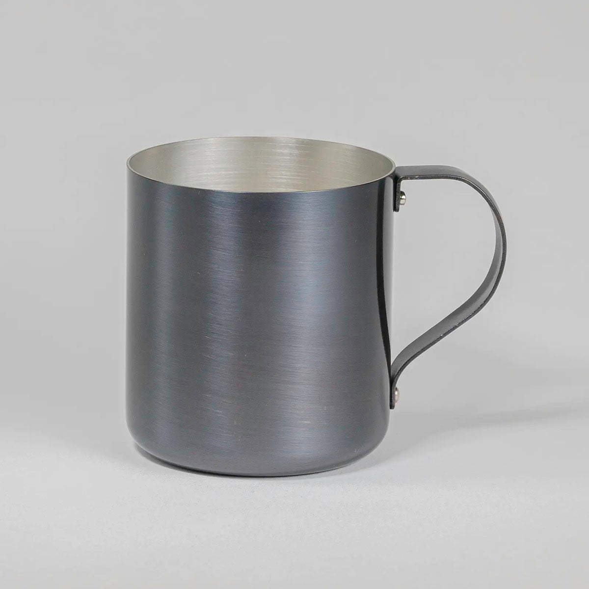Side view of dark gray copper mug, showcasing its sleek matte finish and elegant design.