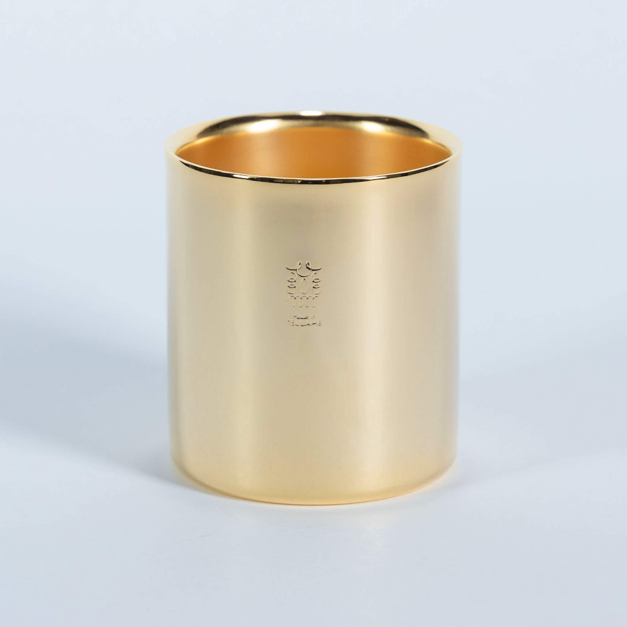 Front view of the 24K gold-plated 18-8 stainless steel insulated coffee and tea cup on a clean background.