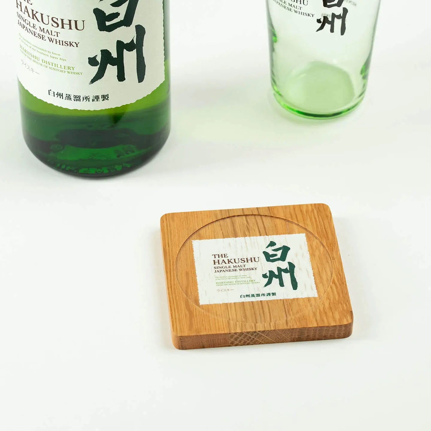 The square Hakushu cask oak coaster, featuring the classic Japanese single malt whisky label design.