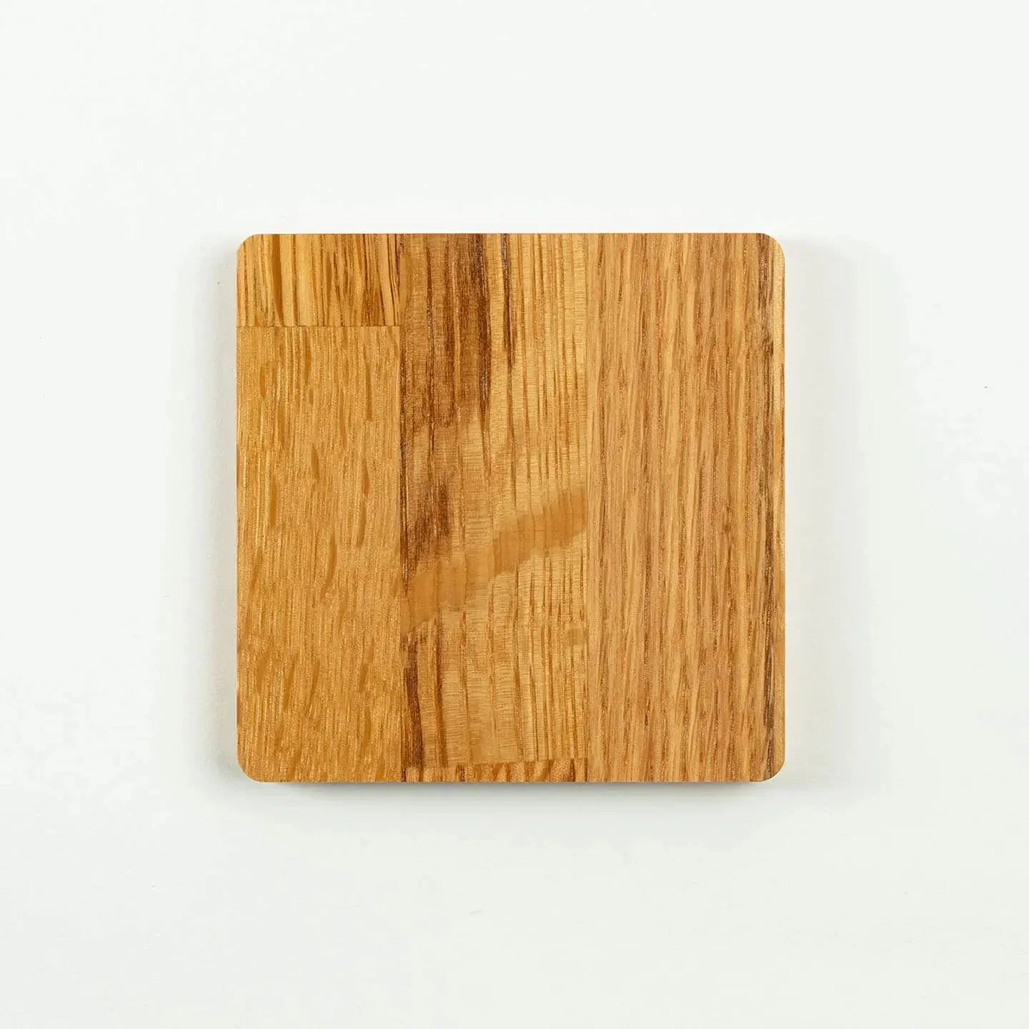 The square Hakushu cask oak coaster, featuring the classic Japanese single malt whisky label design.