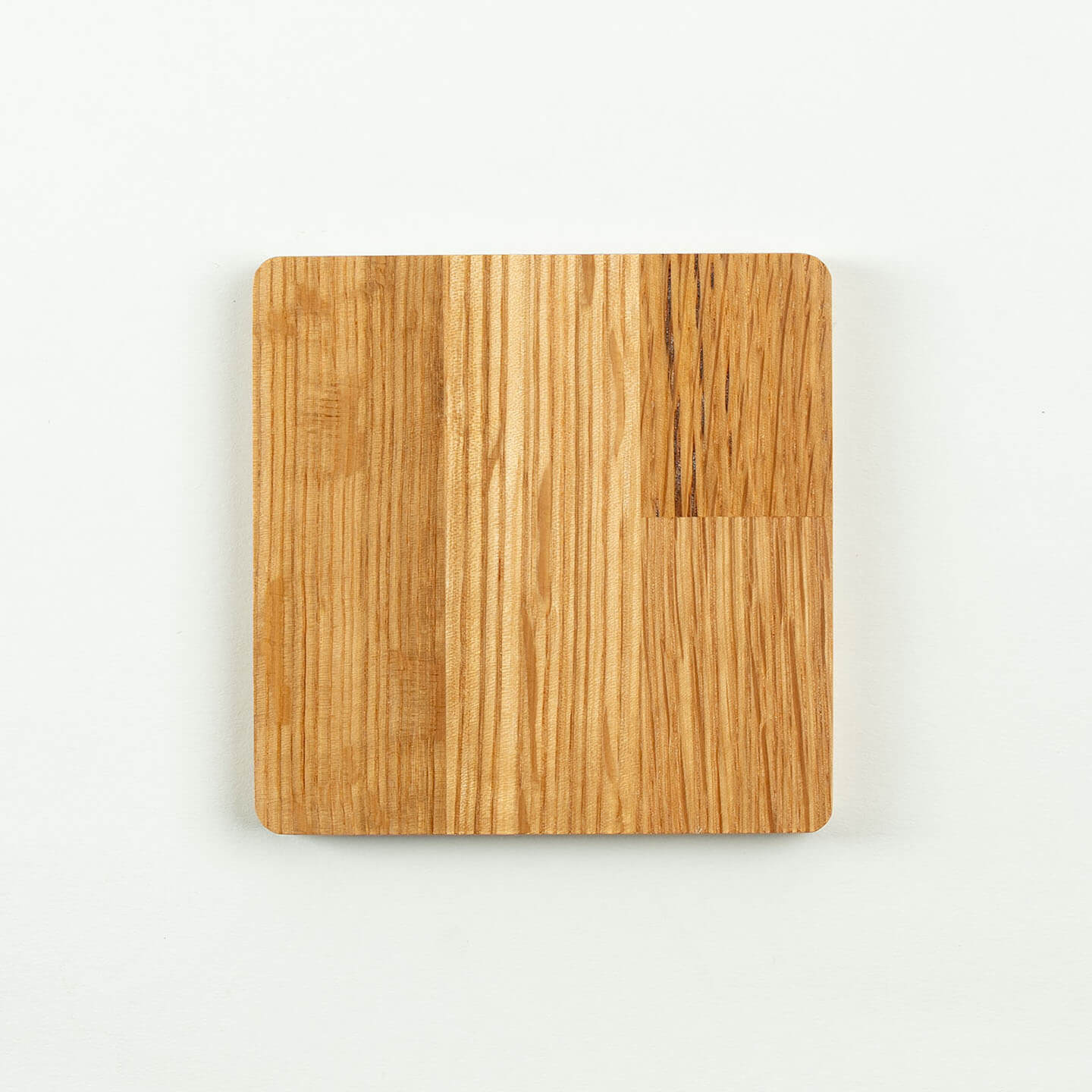 The square Hibiki cask oak coaster, featuring the classic 'Japanese Harmony' whisky label design.