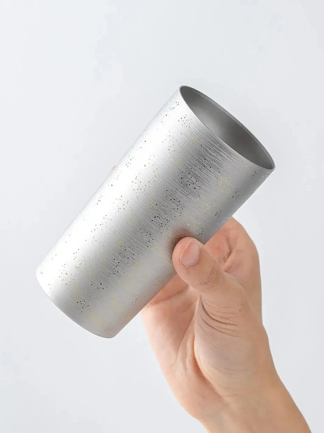 Slightly top-angled view of HORIE Ryo Silver Mist tumbler (350ml) in hand