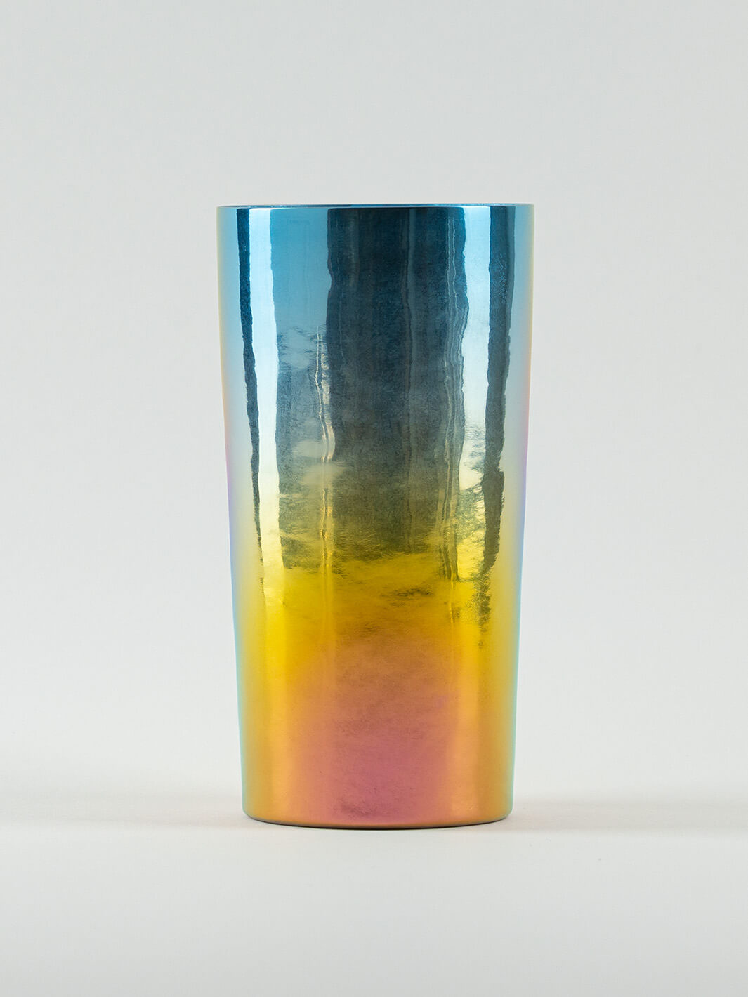 Front view of HORIE Saiko Series titanium tumbler (350ml), iridescent rainbow finish.