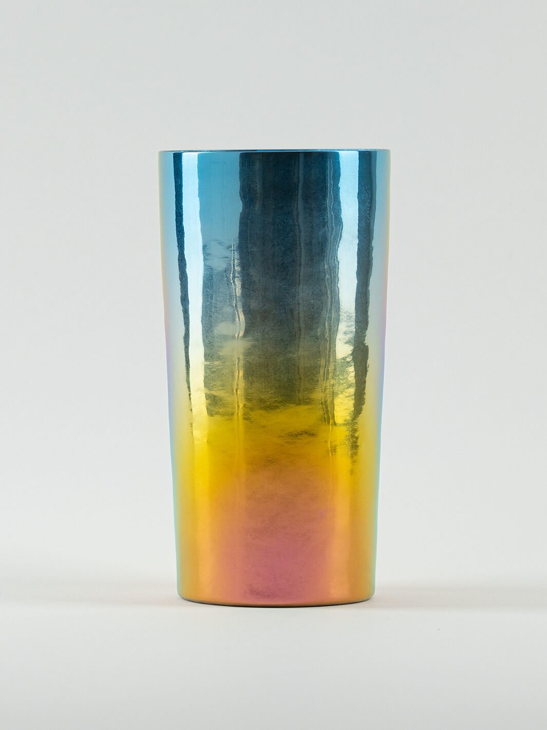 Front view of HORIE Saiko Series titanium tumbler (350ml), iridescent rainbow finish.