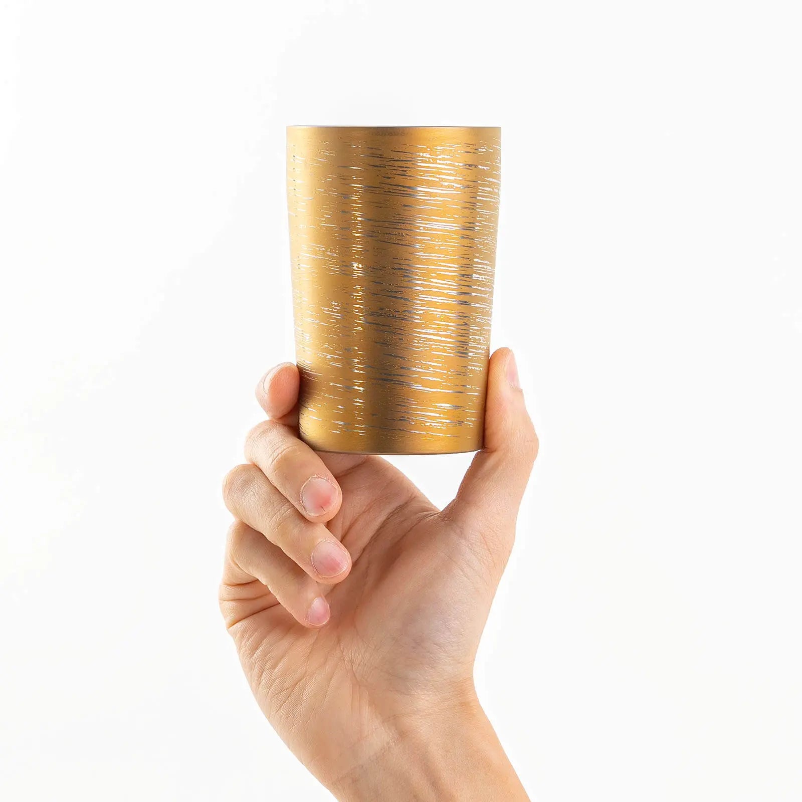 Lightweight 270ml brown titanium tumbler, hand-held front view, HORIE Shirakaba Series