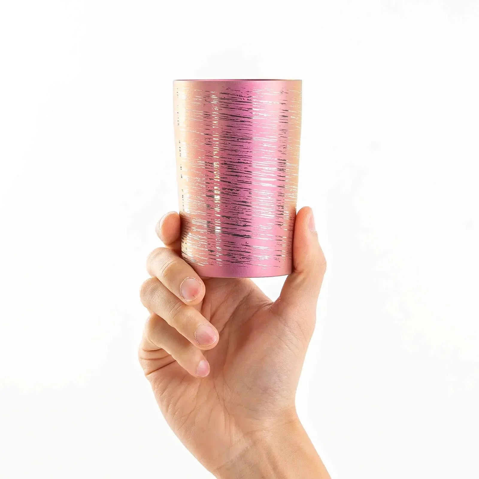 Lightweight 270ml pink titanium tumbler, hand-held front view, HORIE Shirakaba Series