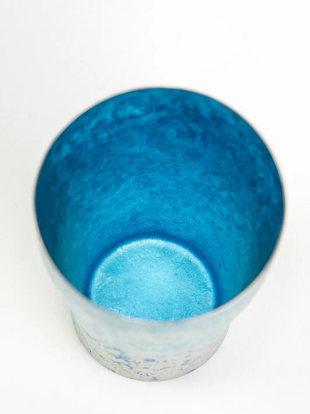 Interior of blue titanium tumbler, clean finish