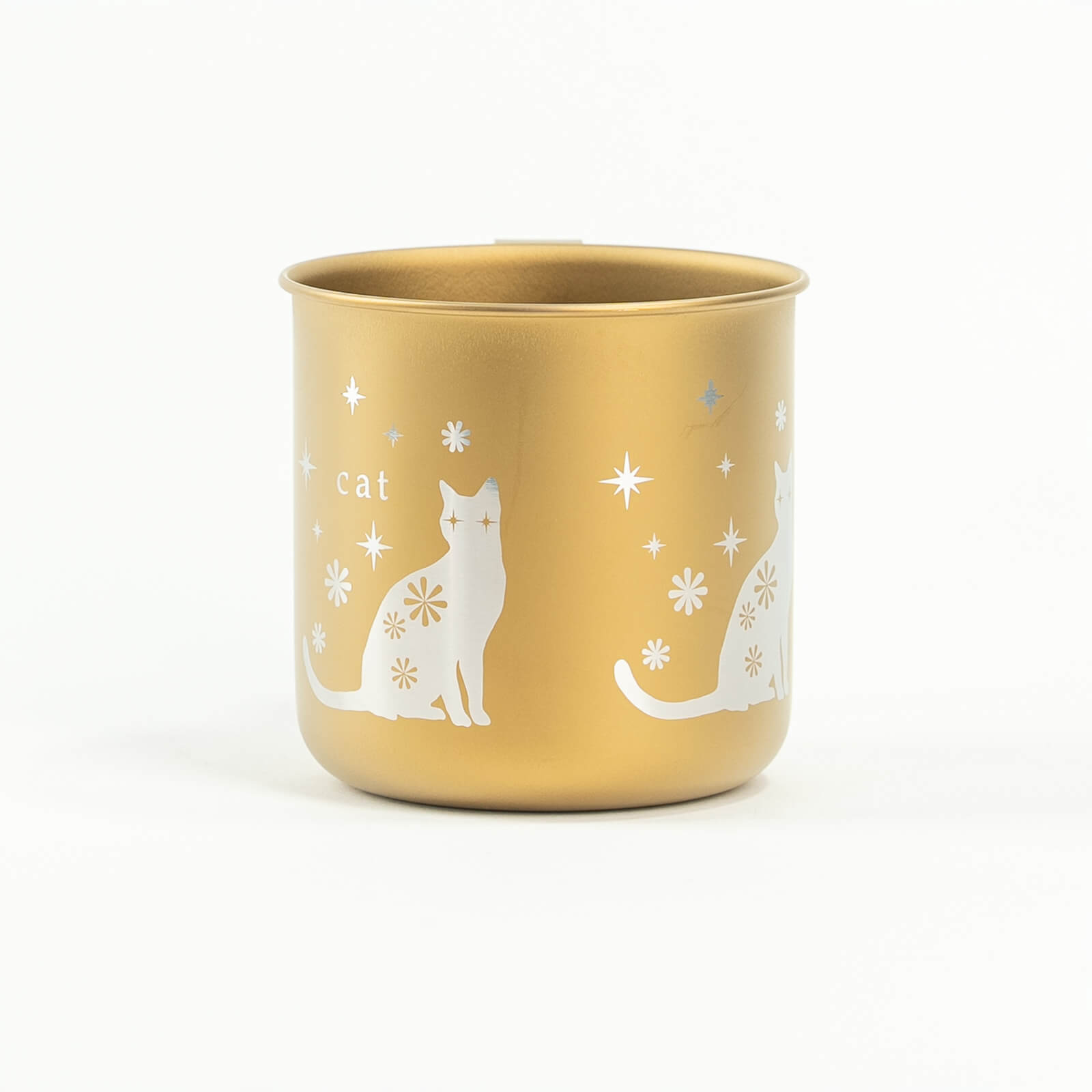 Side view of HORIE titanium cat mug in gold