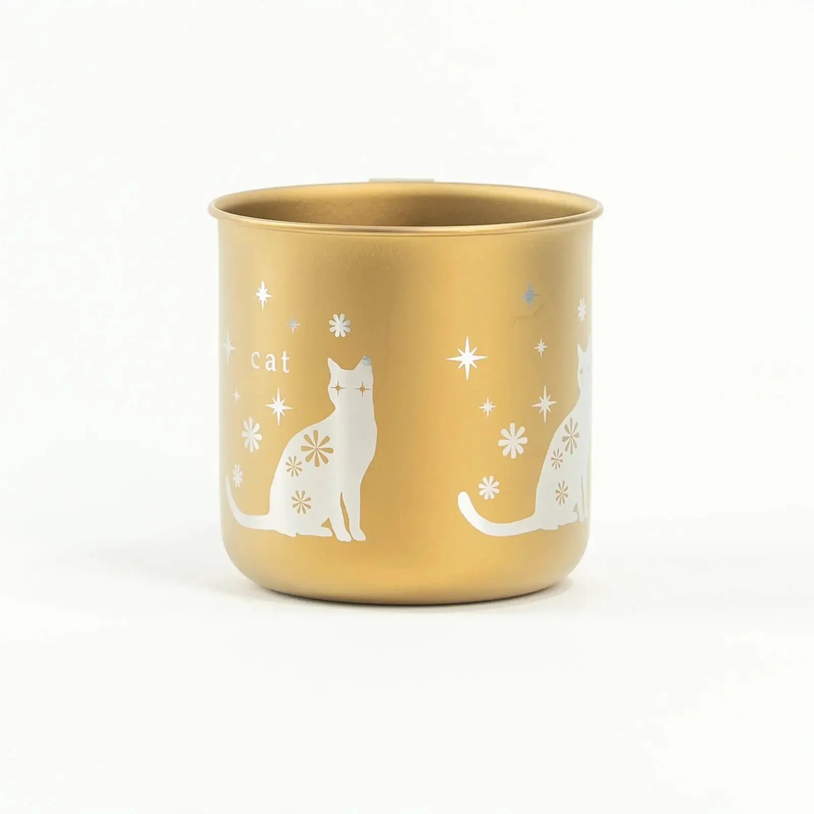 Side view of HORIE titanium cat mug in gold