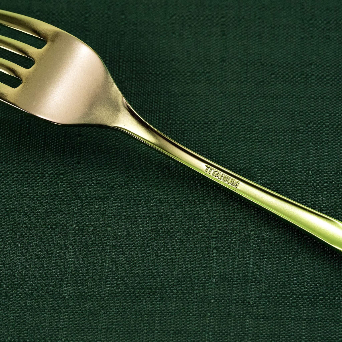 Close-up of the pink gradient HORIE pure titanium dessert fork