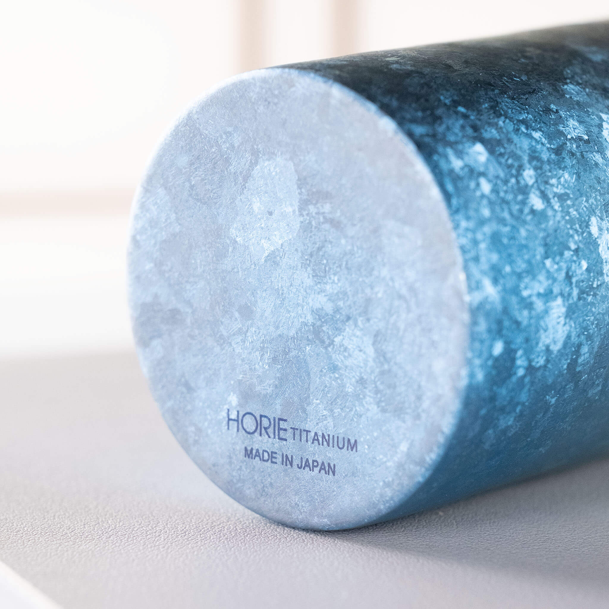 HORIE Titanium Kamazukuri 350ml Blue Tumbler inverted on white background showing base with brand mark