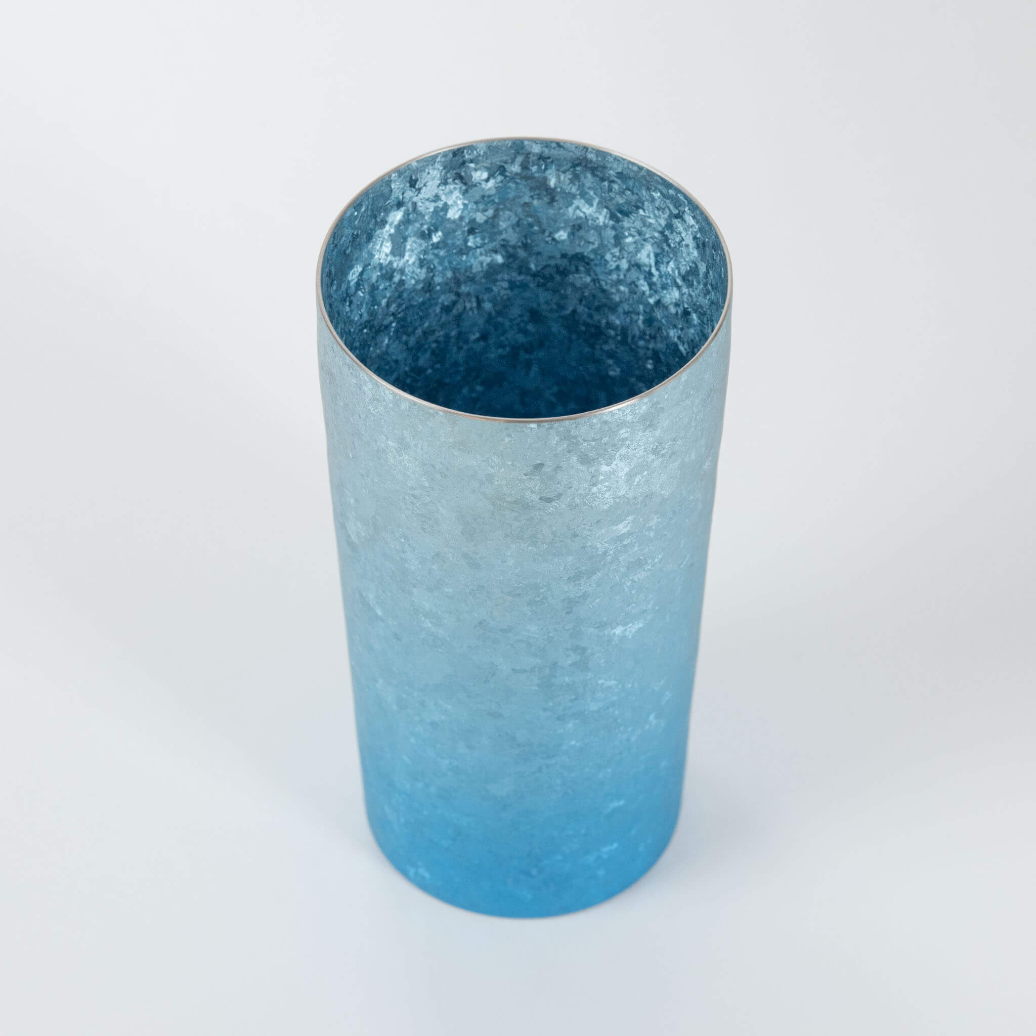 Angled top view of HORIE Titanium Kamazukuri 350ml Blue Tumbler showing interior titanium finish and rim detail