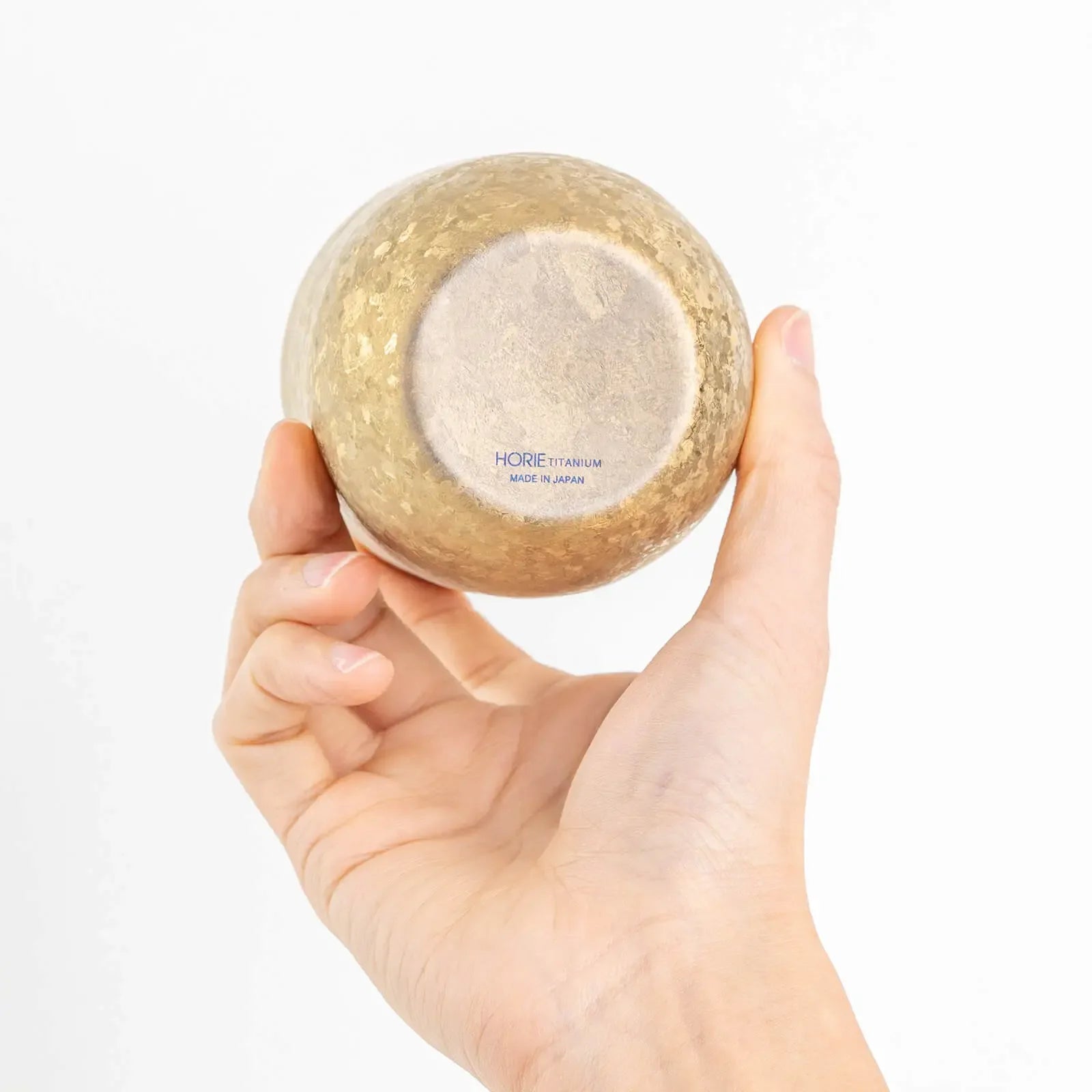 Horie Gold Titanium Tumbler with engraved logo at the bottom