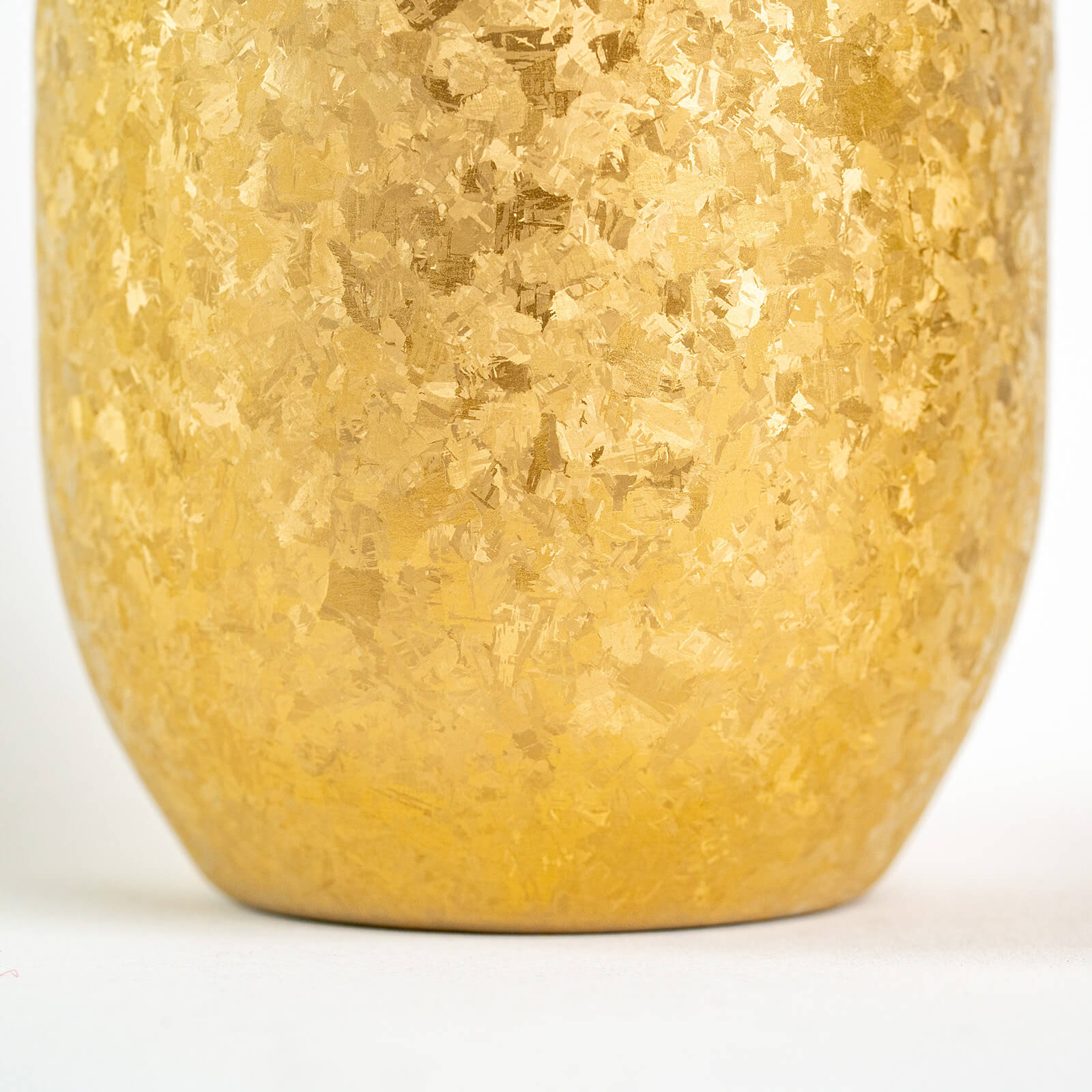 Fine brushed titanium finish on the Horie Gold Tumbler