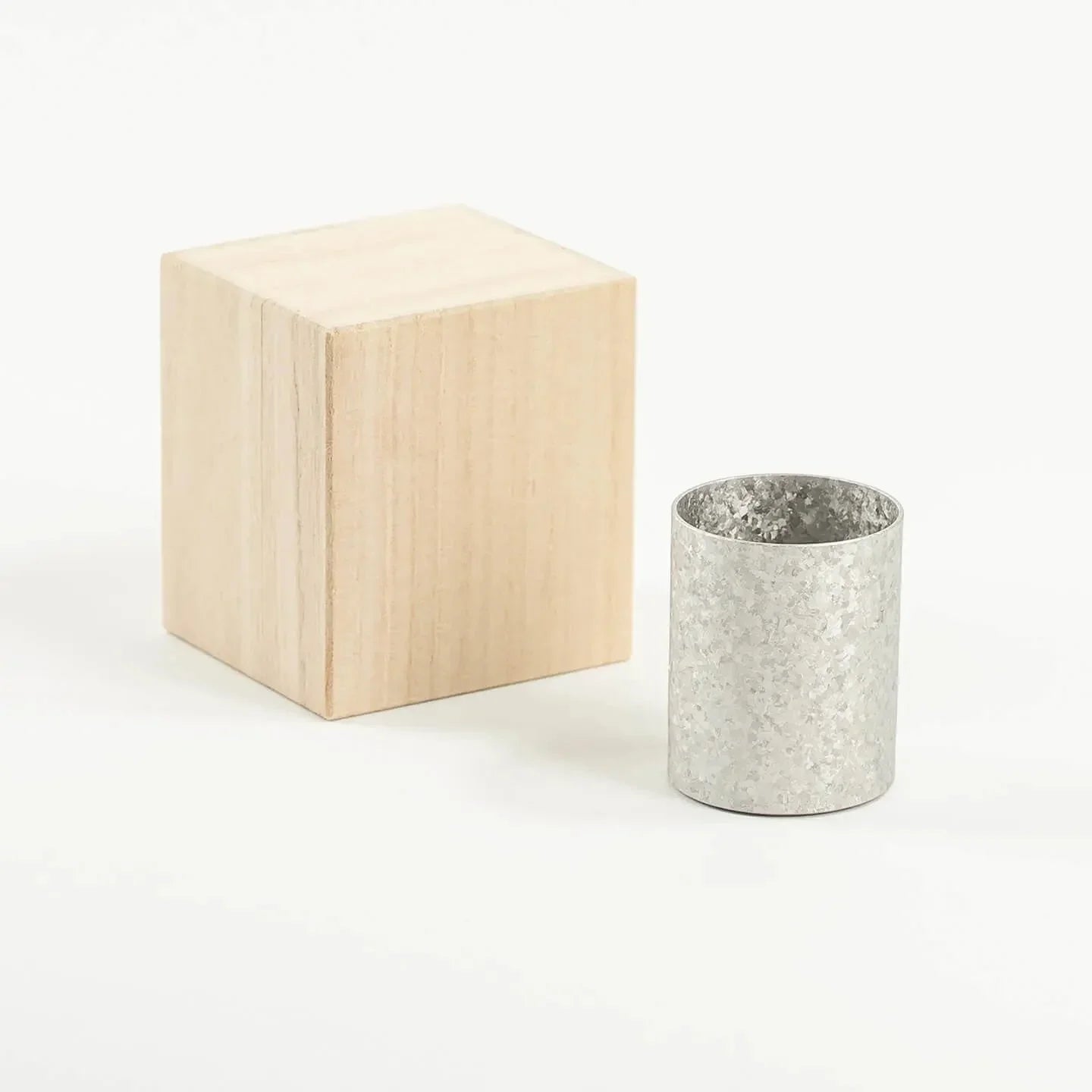 The HORIE Titanium Sake Cup (Silver) shown with its luxury paulownia wood gift box.
