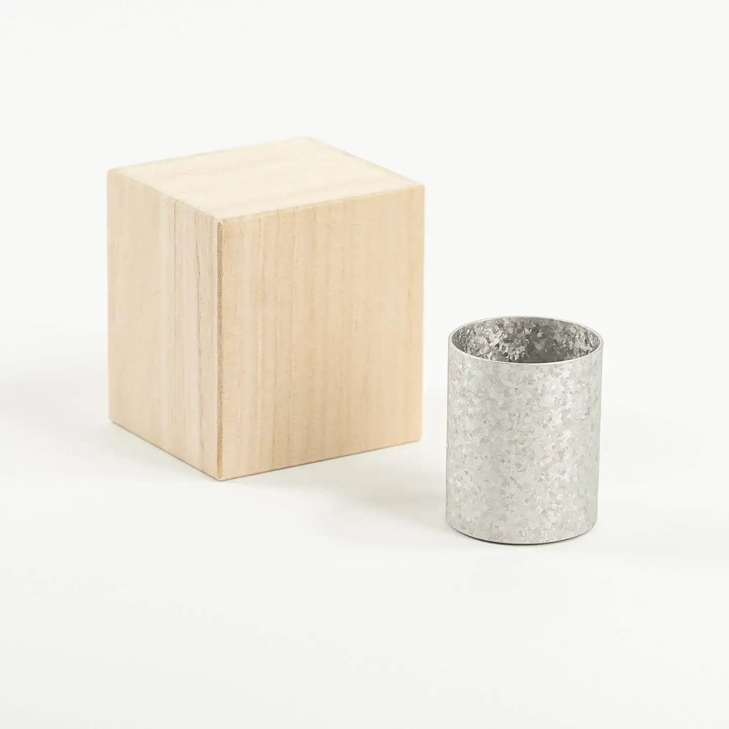 The HORIE Titanium Sake Cup (Silver) shown with its luxury paulownia wood gift box.