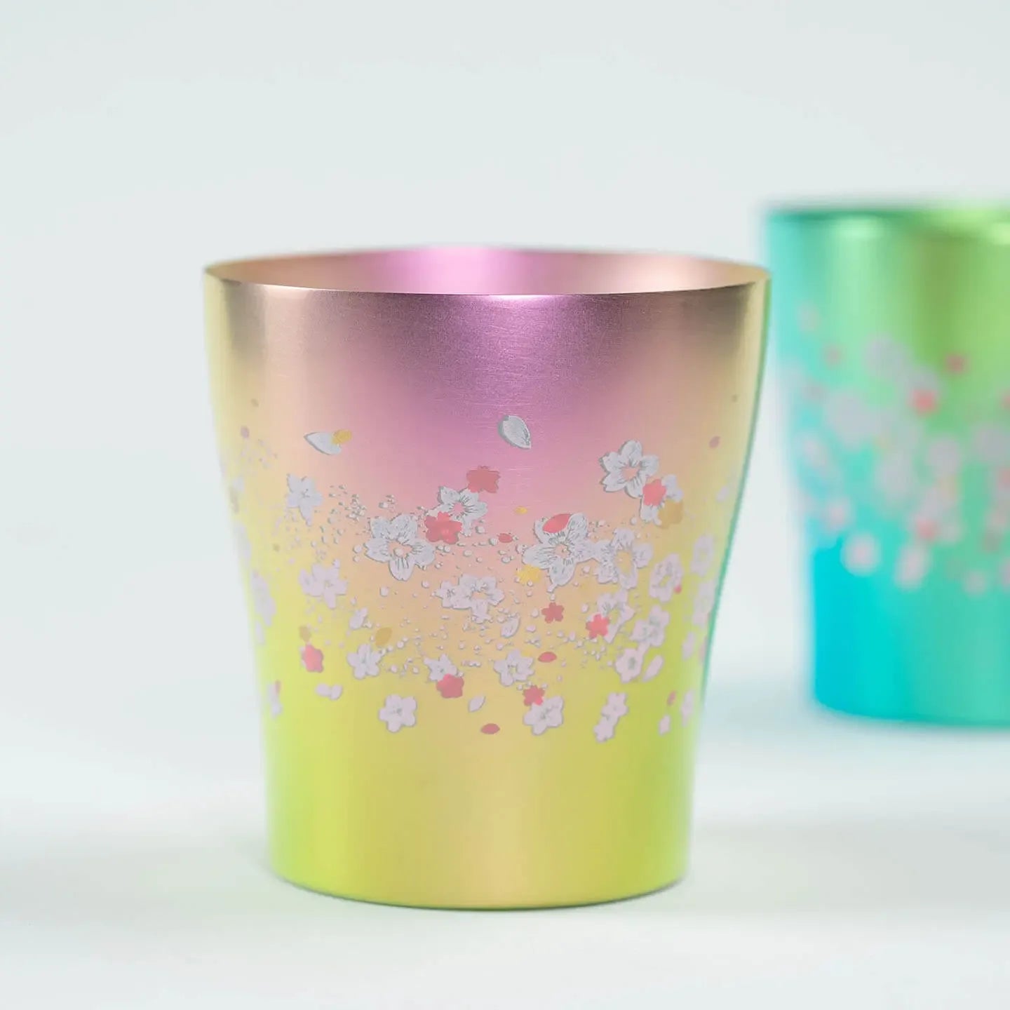 Studio shot of the pink HORIE Sakura Saku titanium tumbler.