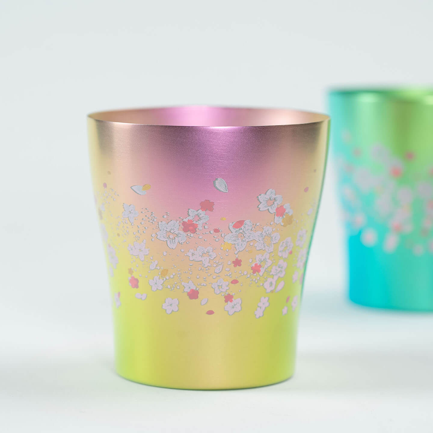 Studio shot of the pink HORIE Sakura Saku titanium tumbler.