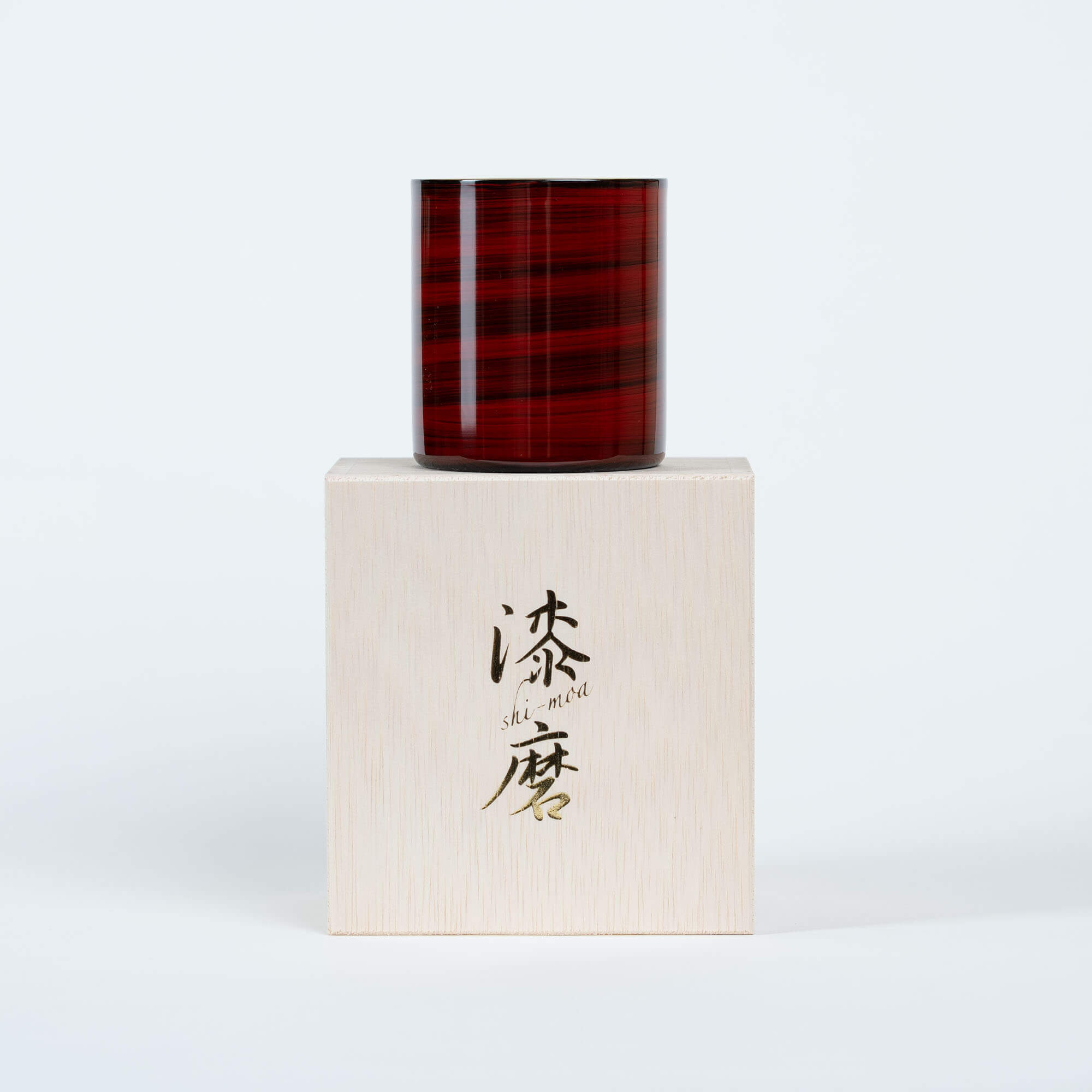 Red Japanese lacquered 250ml sake cup standing on its wooden gift box