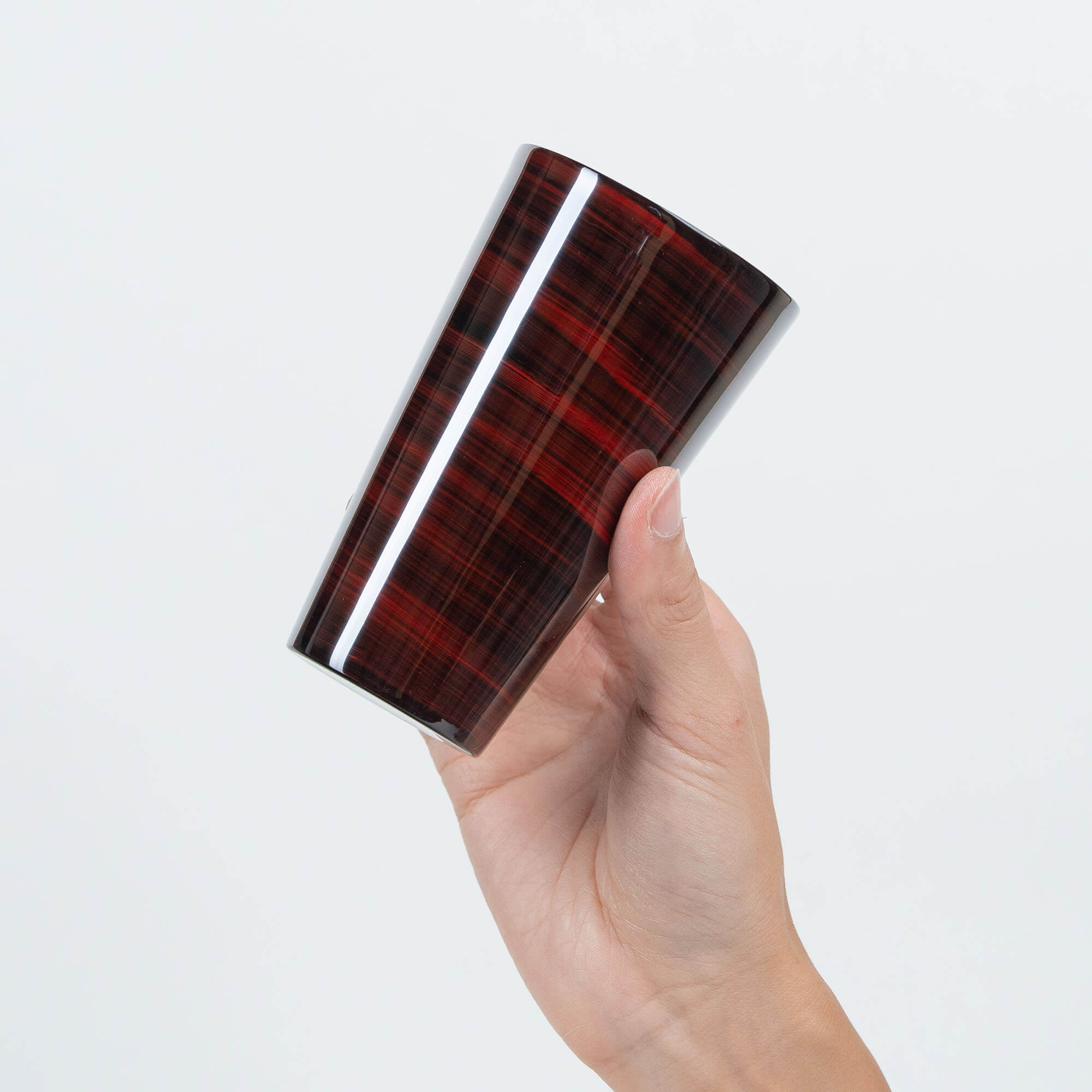 Angled side view of a red Japanese lacquered 300ml stainless steel tumbler