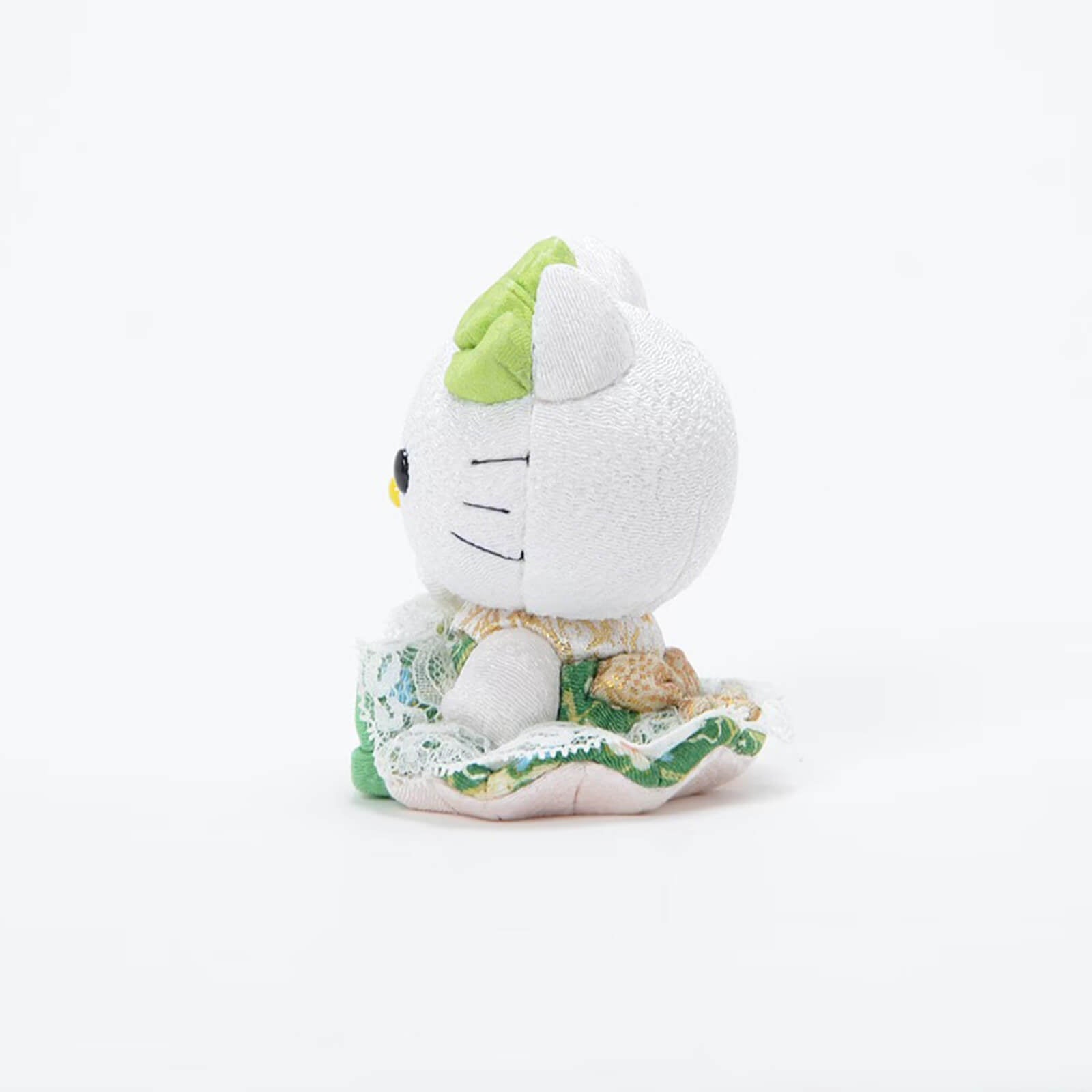 Green Hello Kitty Seated Lucky Cat Side View Lace Texture - kyotolux