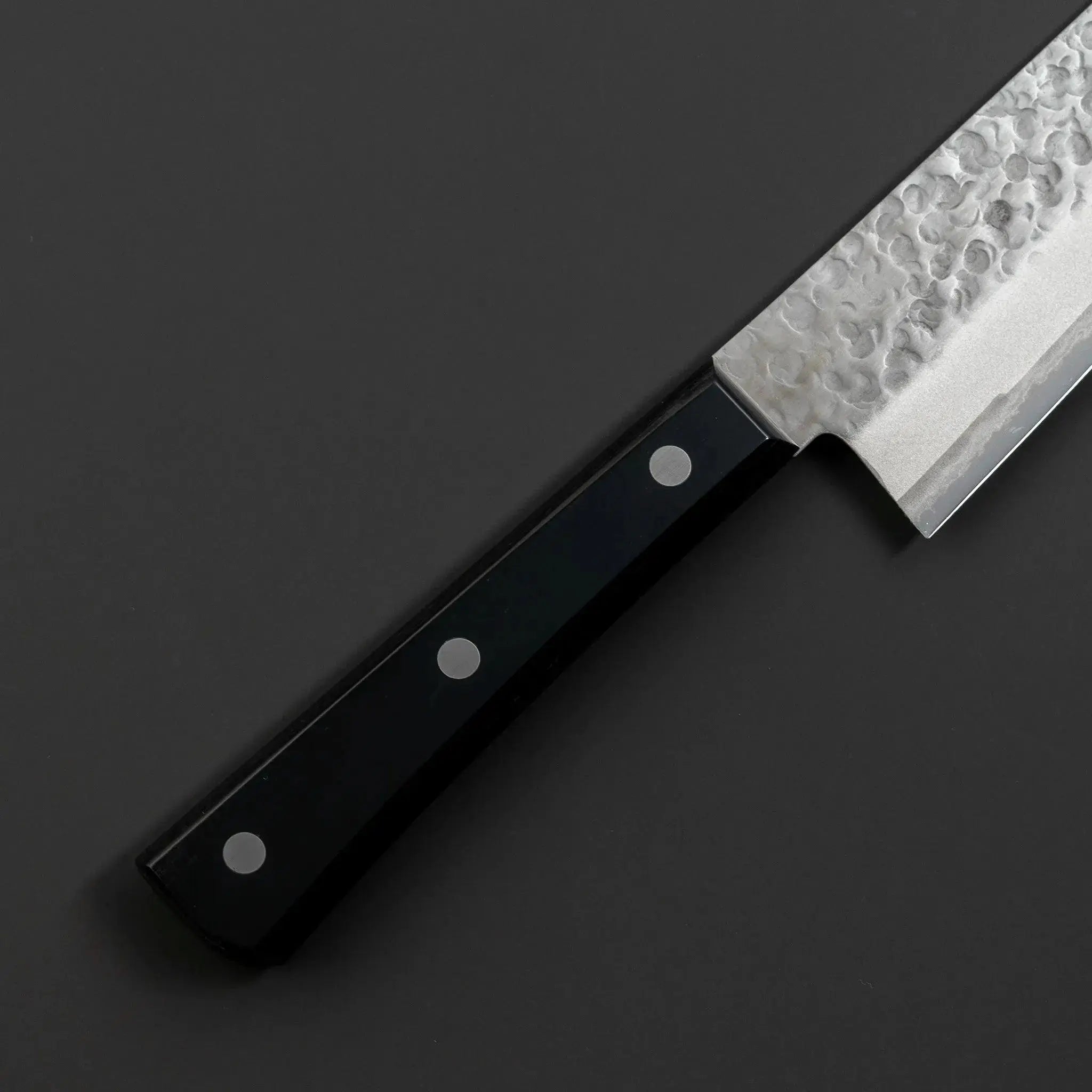 Kirin VG1 Steel Santoku Knife, triple-layered for enhanced durability, perfect for precision cutting in professional and home kitchens