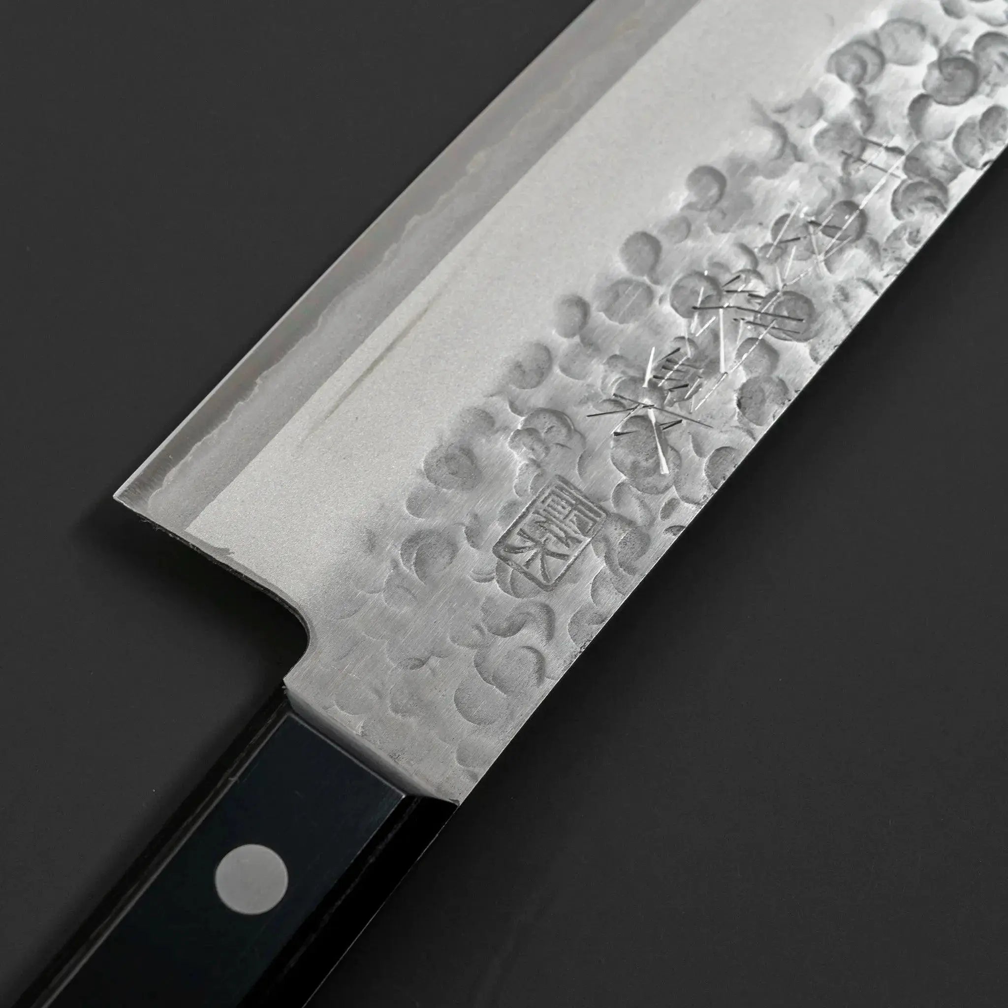 Kirin VG1 Steel Santoku Knife, triple-layered for enhanced durability, perfect for precision cutting in professional and home kitchens