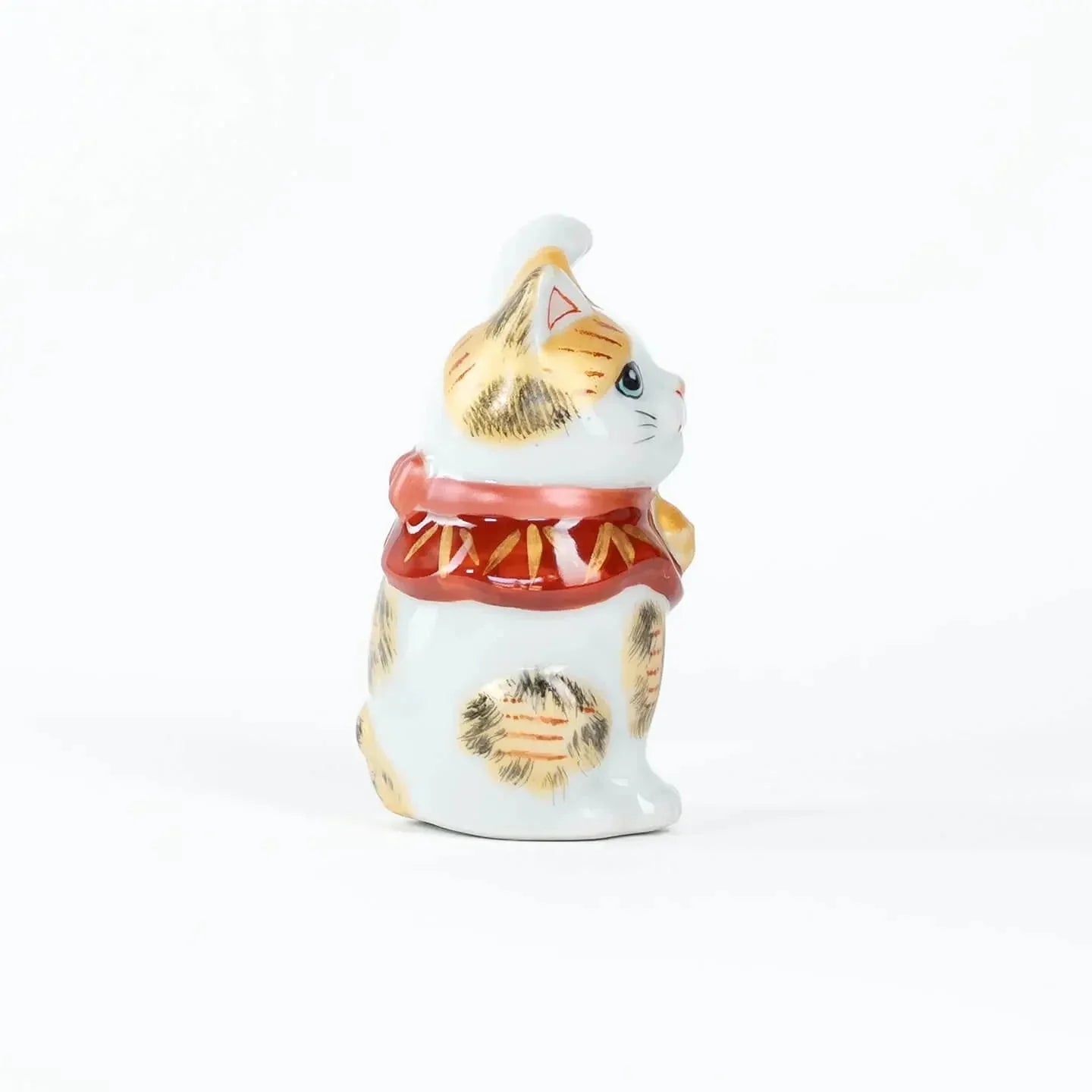 Traditional Kutani ceramic lucky cat, 8.7cm tall – right side view.