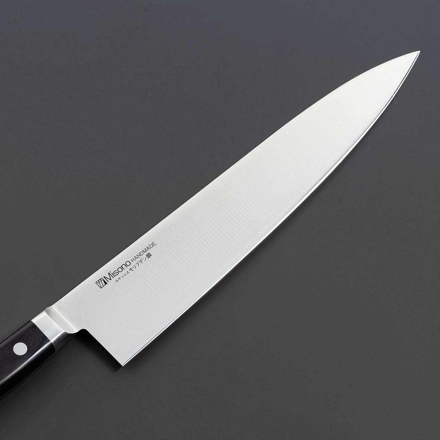 Close-up of the Misono logo on the molybdenum stainless steel gyuto blade