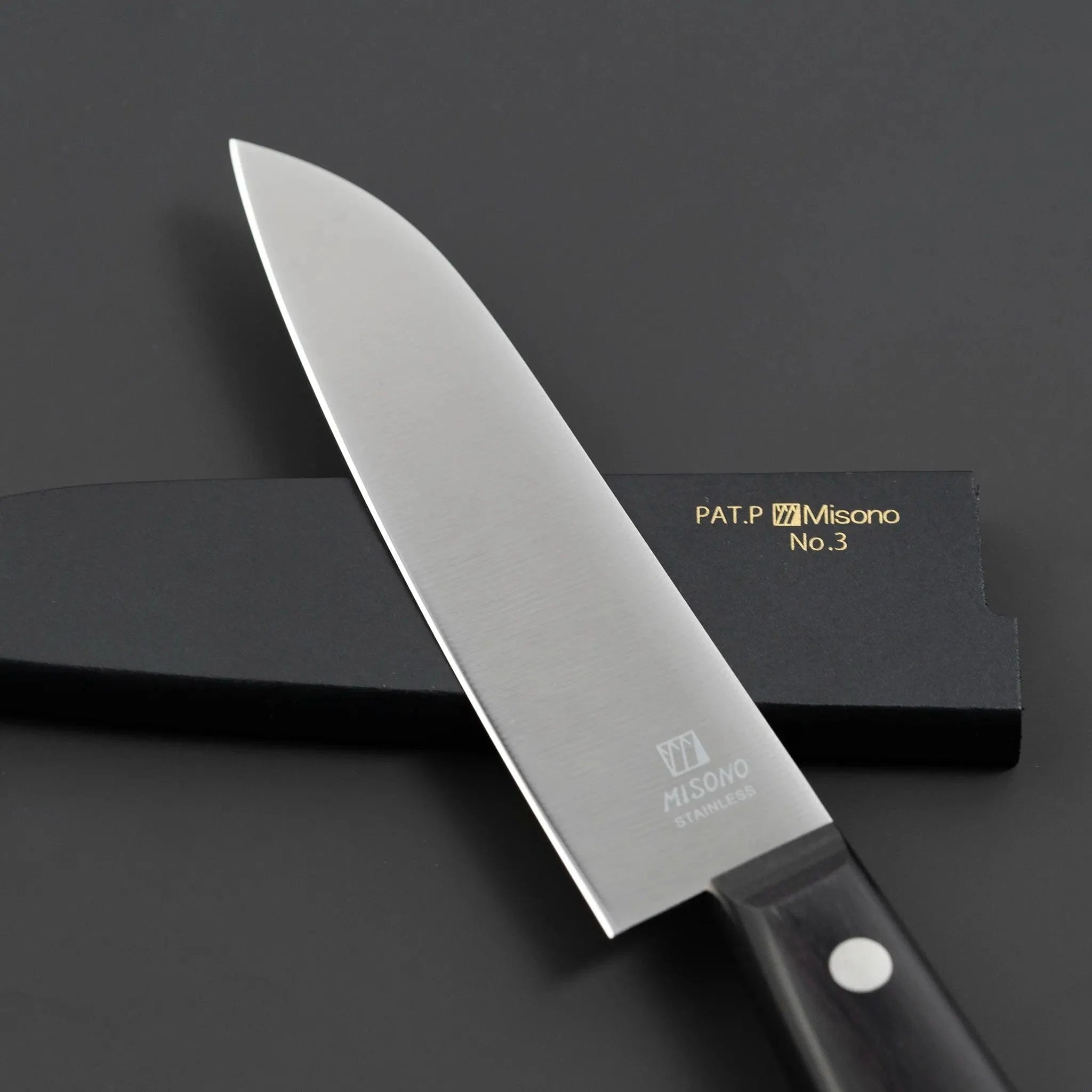 Misono Molybdenum Steel Petty Knife for Precision Cutting, featuring ergonomic handle and sharp blade Blade Logo