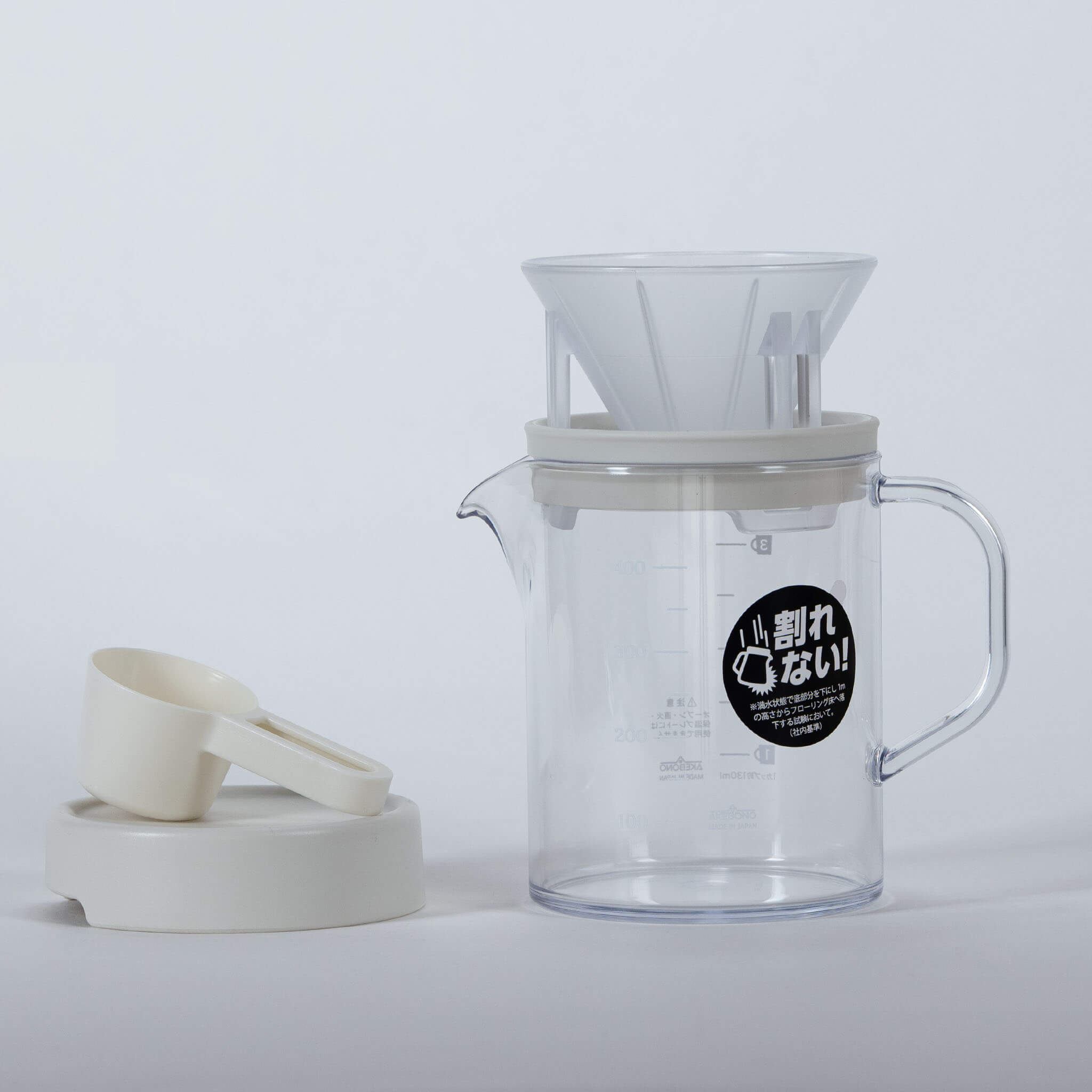 Hand holding STRON Compact Dripper