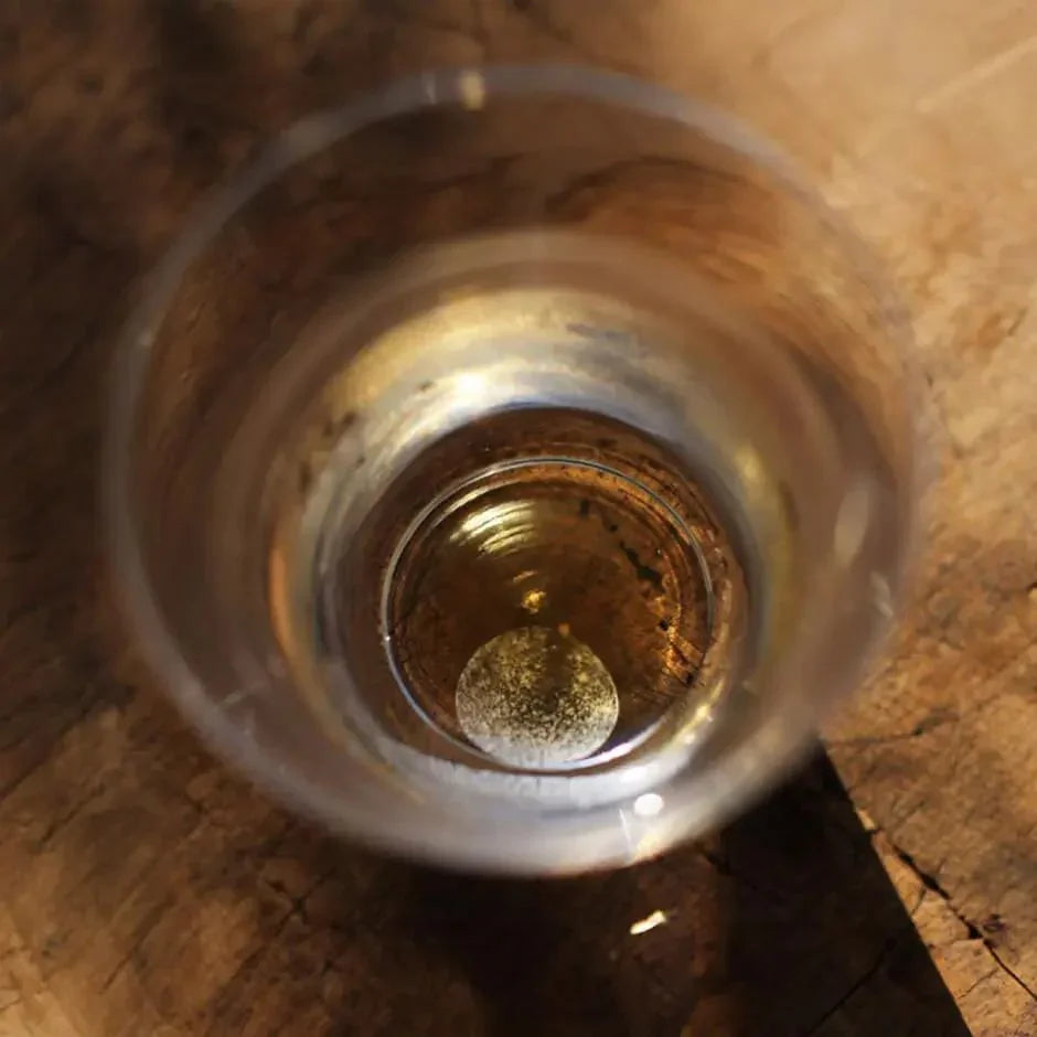 top view of suntory x sghr kasumizuki rock glass showing white moon design