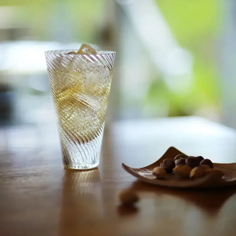 suntory x sghr spiral whiskey glass with whiskey and ice