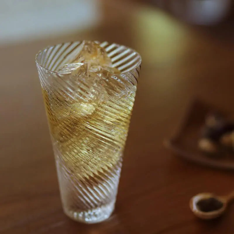 suntory x sghr spiral whiskey glass on dining table setting