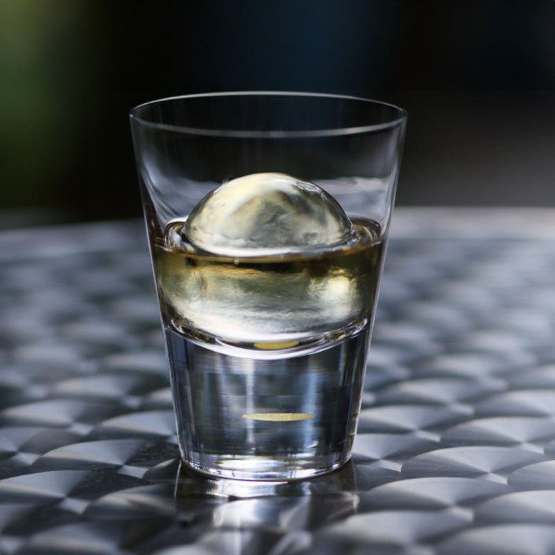 top view of suntory x sghr tsukimi rock glass showing gold leaf moon design