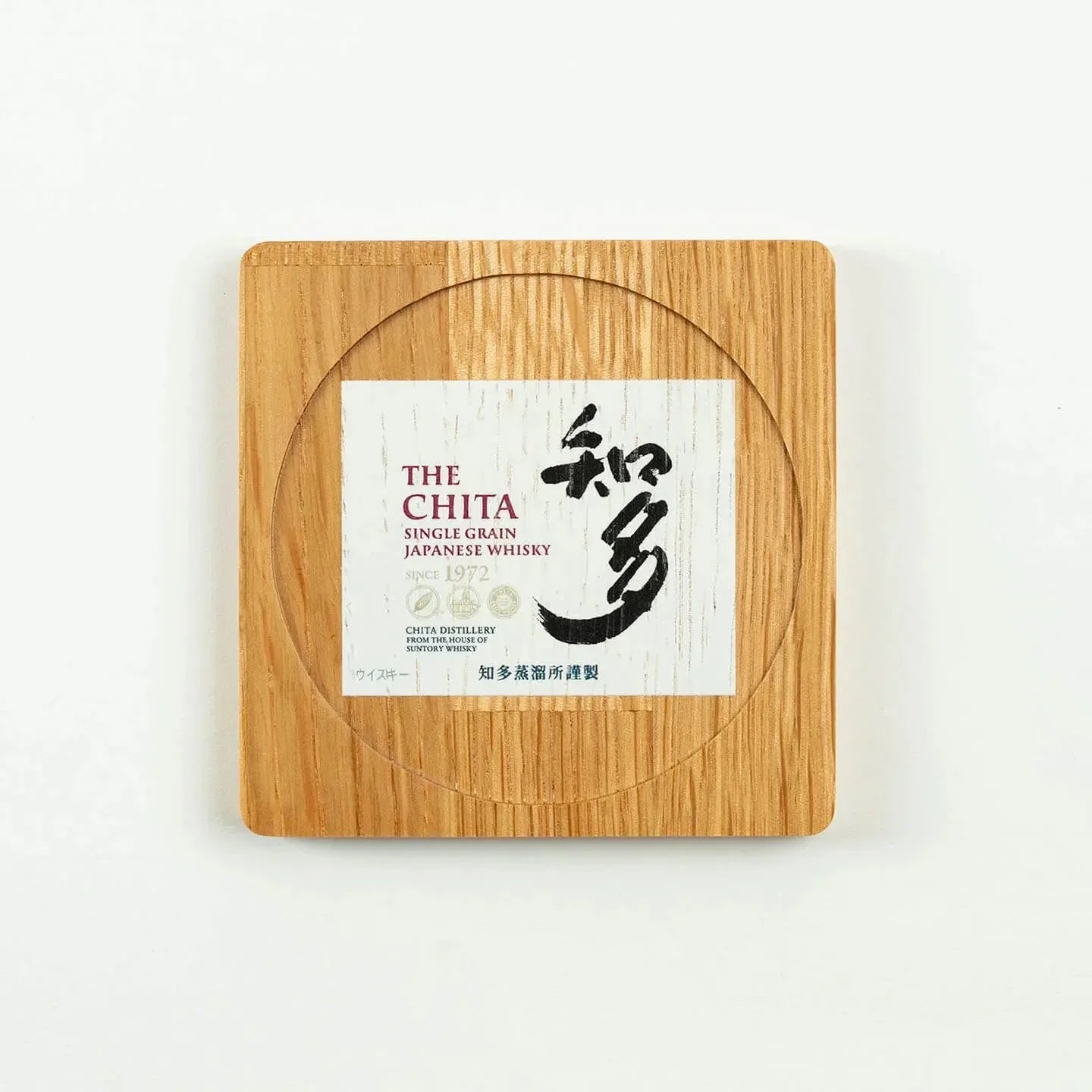 The square The Chita cask oak coaster, featuring the classic Japanese single grain whisky label design.