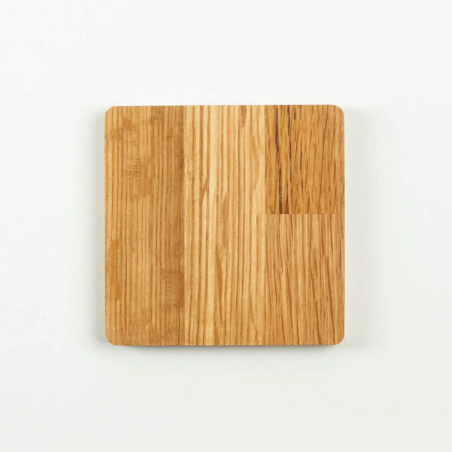The square The Chita cask oak coaster, featuring the classic Japanese single grain whisky label design.