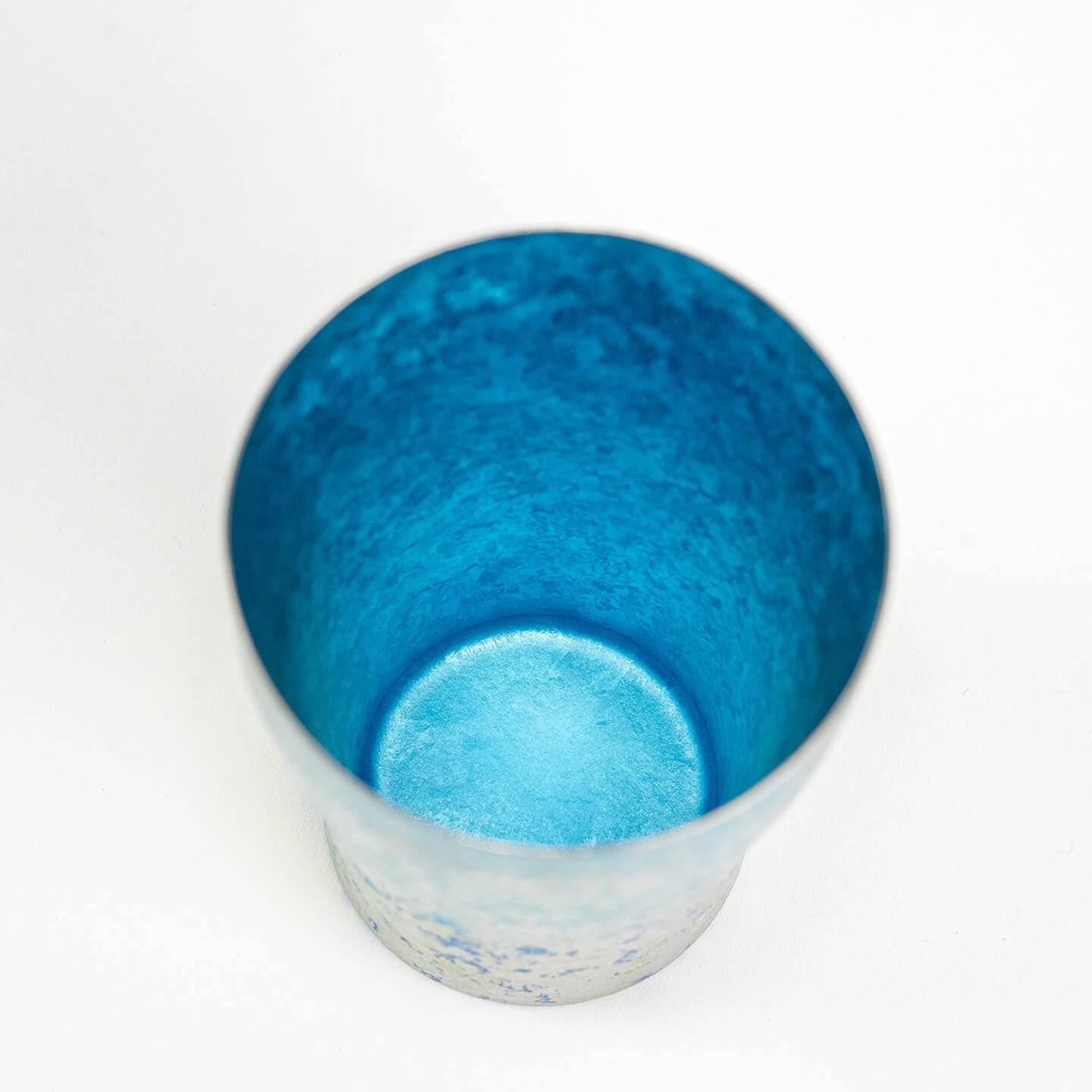 Interior of blue titanium tumbler, clean finish