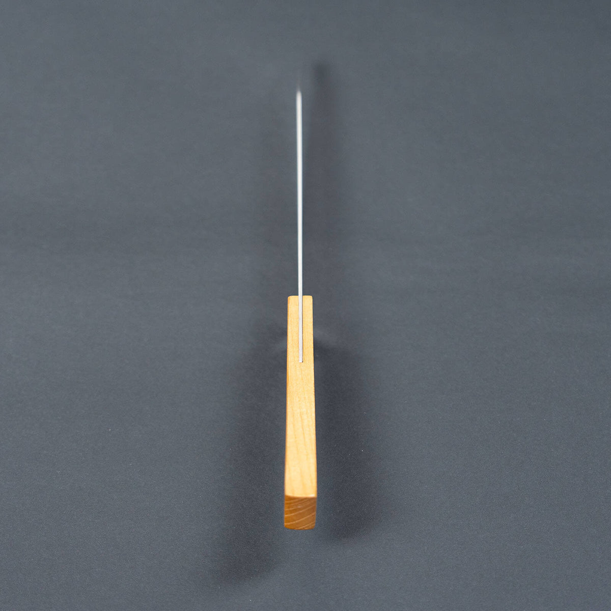 Spine view of the Shizuhamono Morinoki 170mm utility knife showing the thin blade and wooden handle