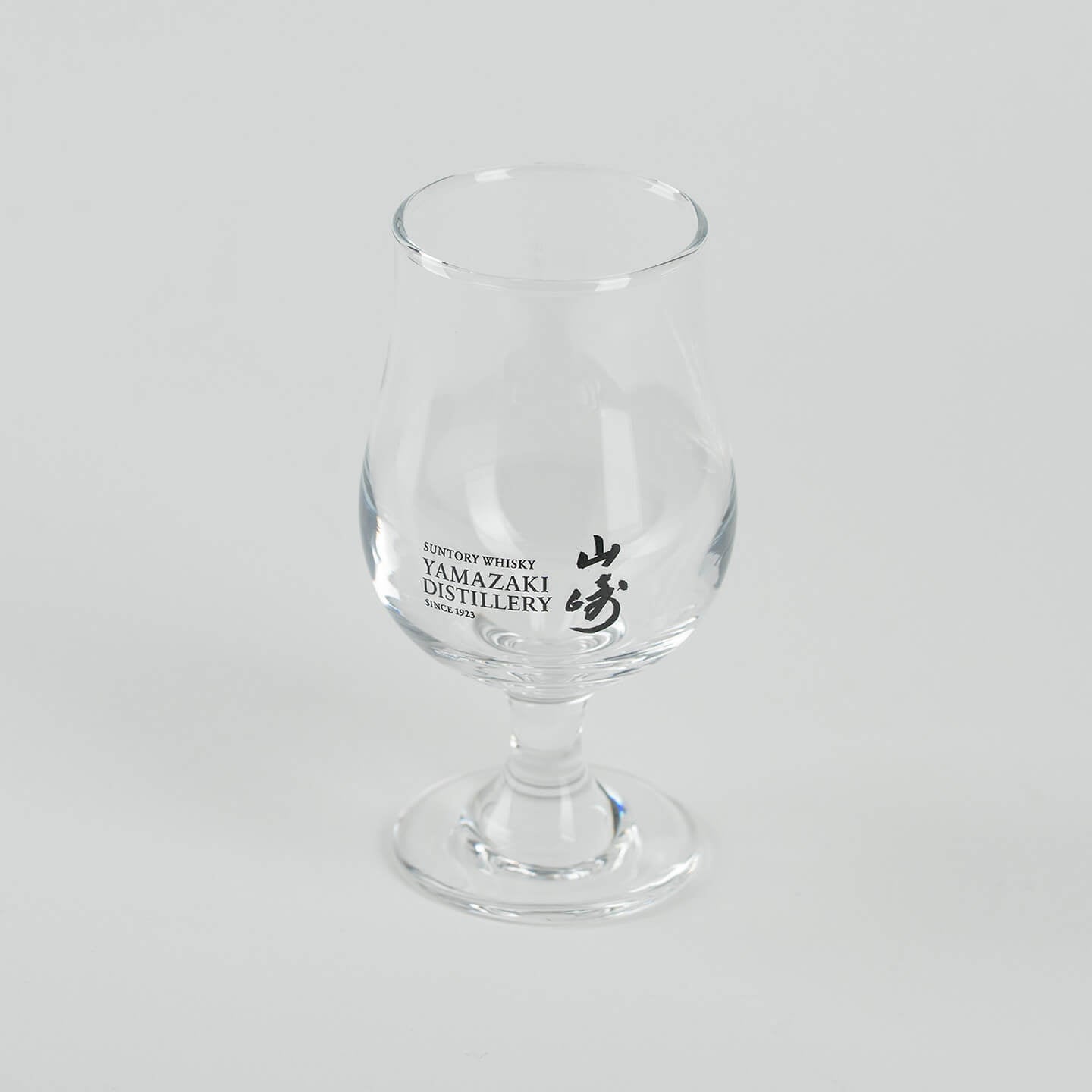 Empty Yamazaki whiskey tasting glass, Japanese tulip-shaped glass