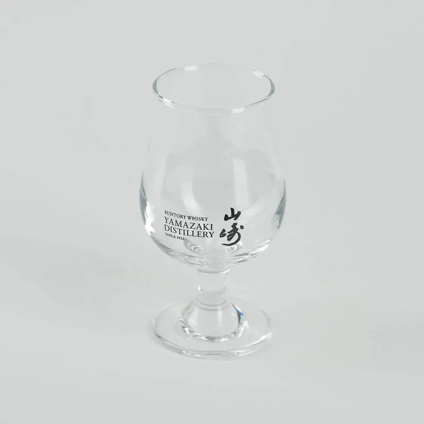 Empty Yamazaki whiskey tasting glass, Japanese tulip-shaped glass