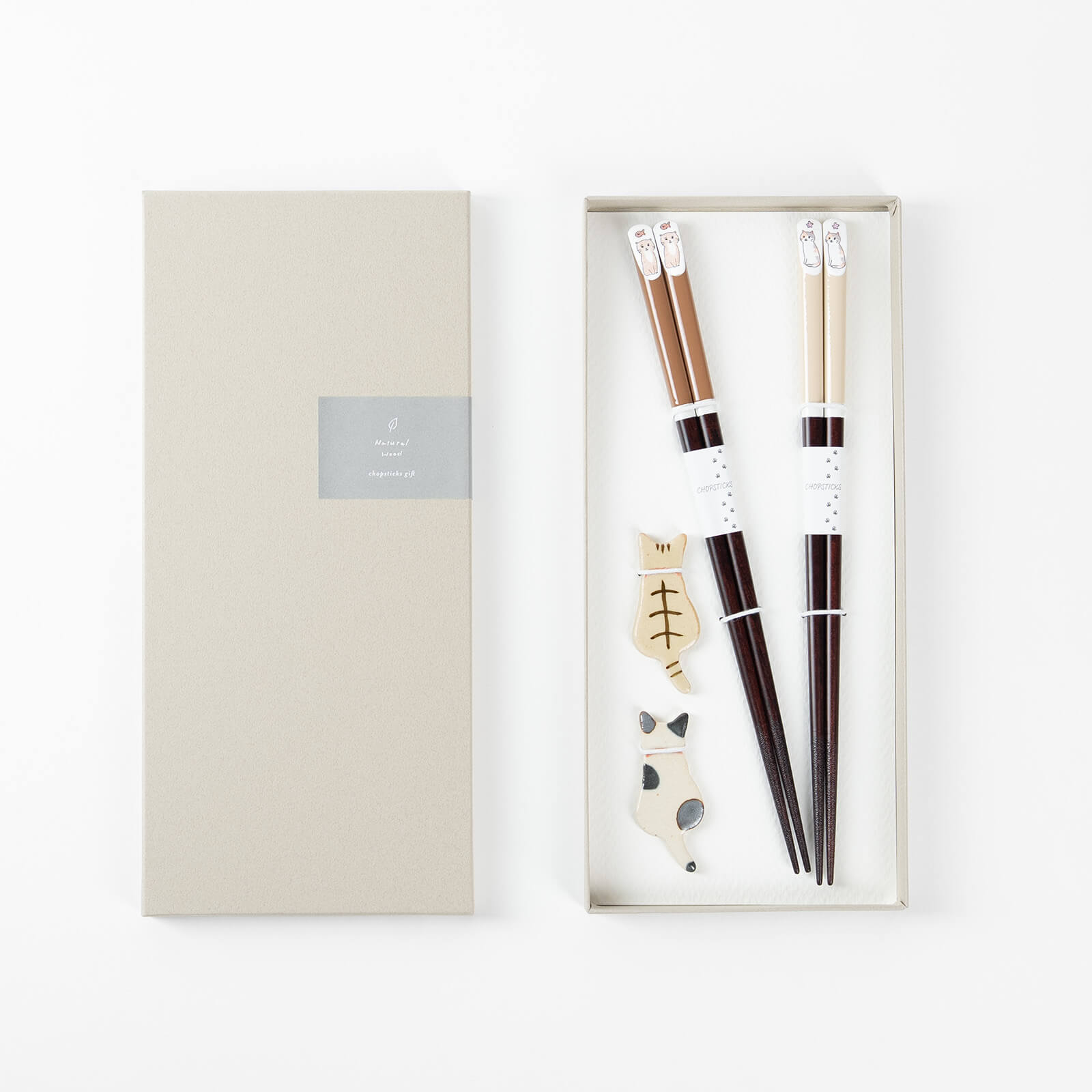 Cat couple chopsticks gift set in brown and beige, 23cm, with matching ceramic chopstick rests.