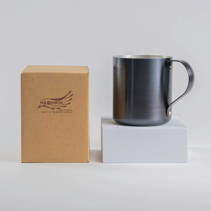 Dark gray copper mug on a white background, perfect for iced coffee or chilled drinks.