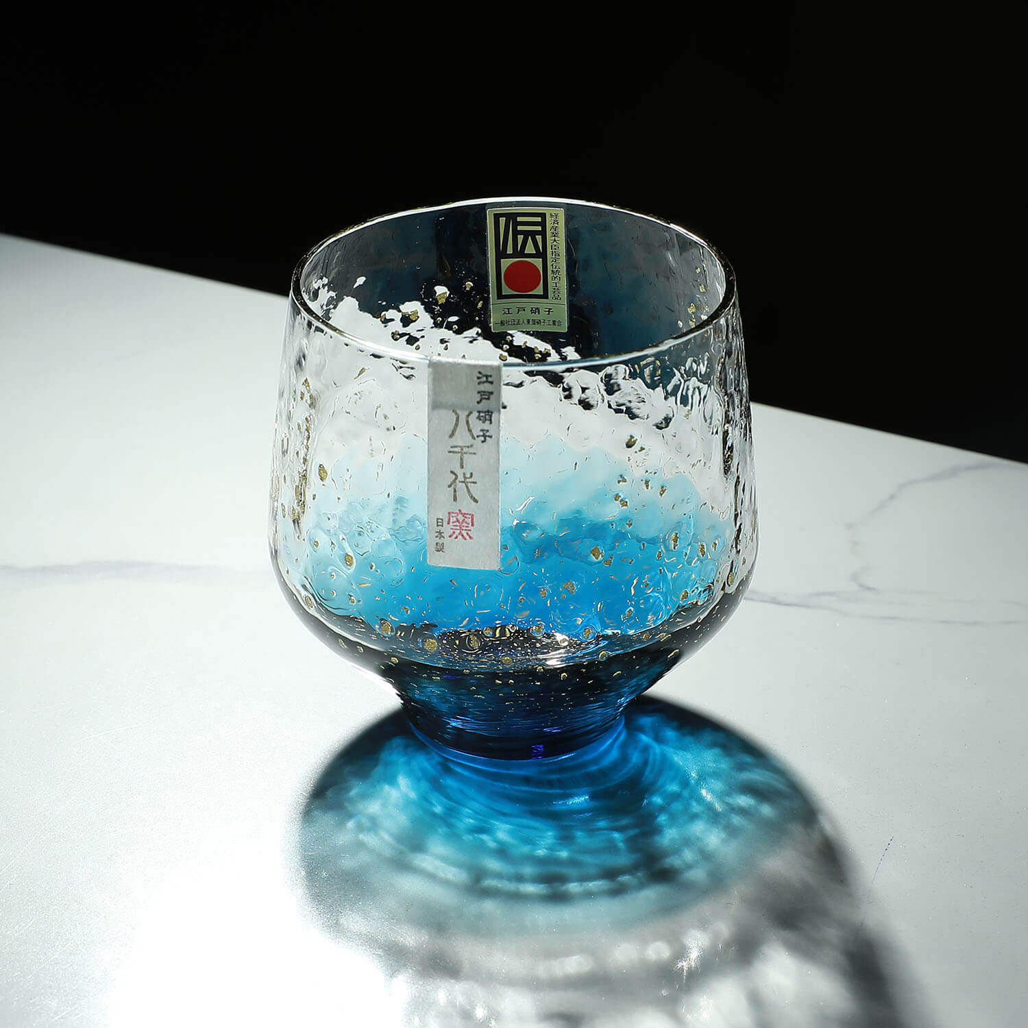 Japanese handmade Edo glass rock cup with blue gradient and gold flakes