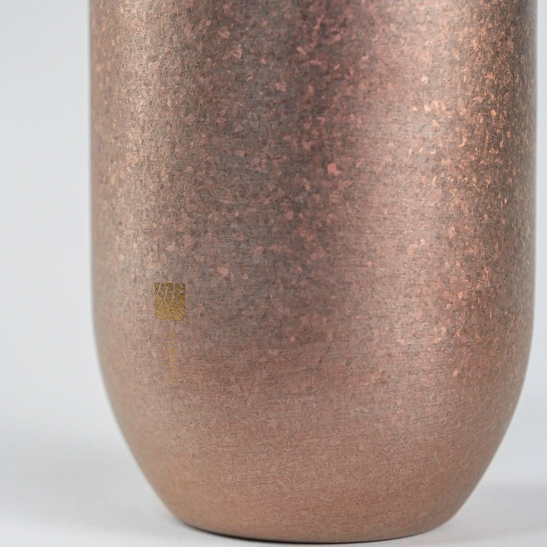 Side view of the silver HORIE Zen Series Double-Walled Titanium Tumbler, highlighting the smooth, reflective finish.