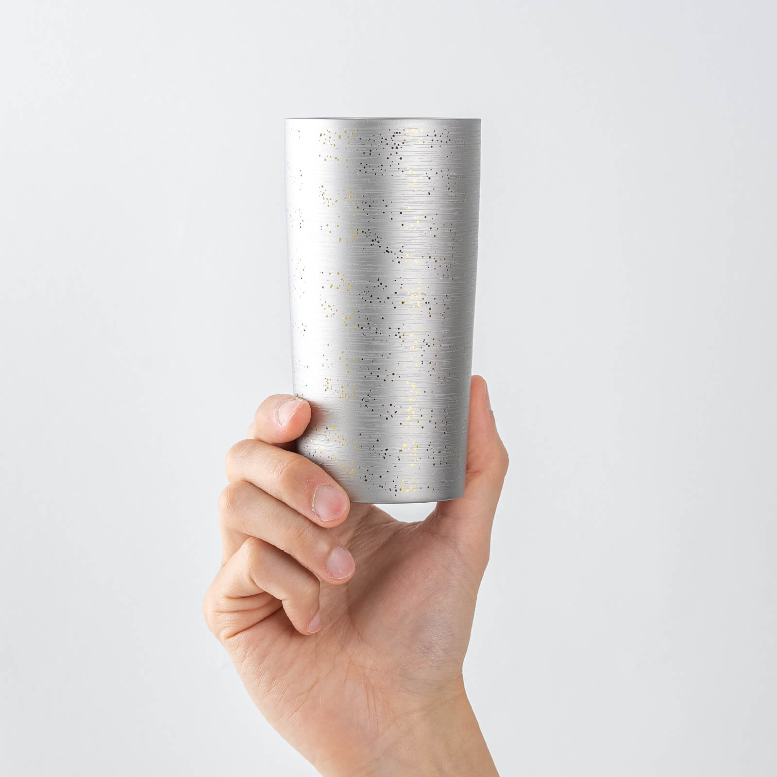 HORIE Ryo Silver Mist titanium tumbler (350ml) held in hand, front view