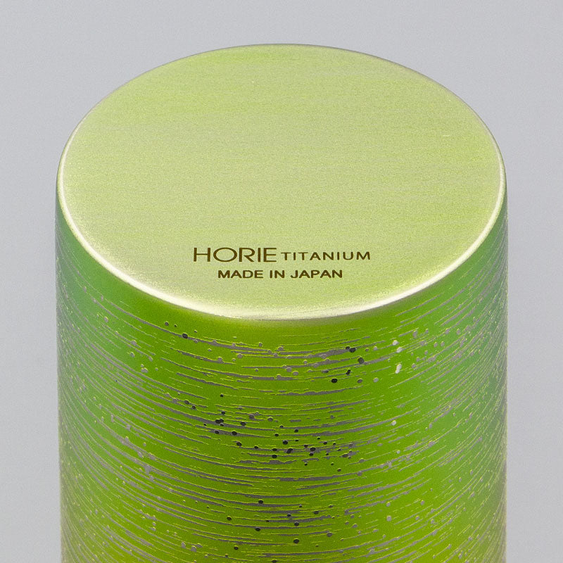 Close-up of HORIE Ryou Series Double-Walled Titanium Tumbler - Pink Green finish