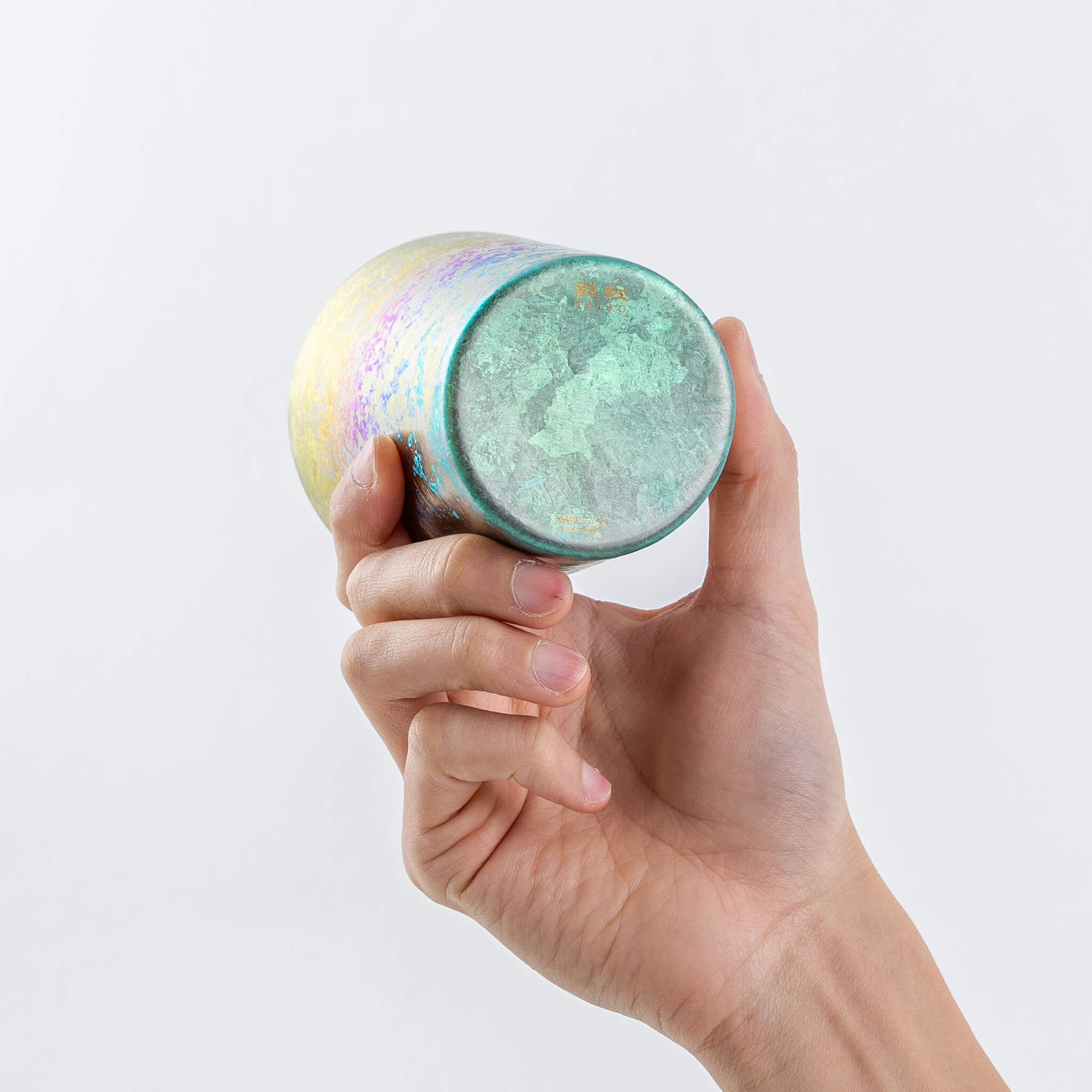 Bottom view of the HORIE Taiko rainbow titanium tumbler
