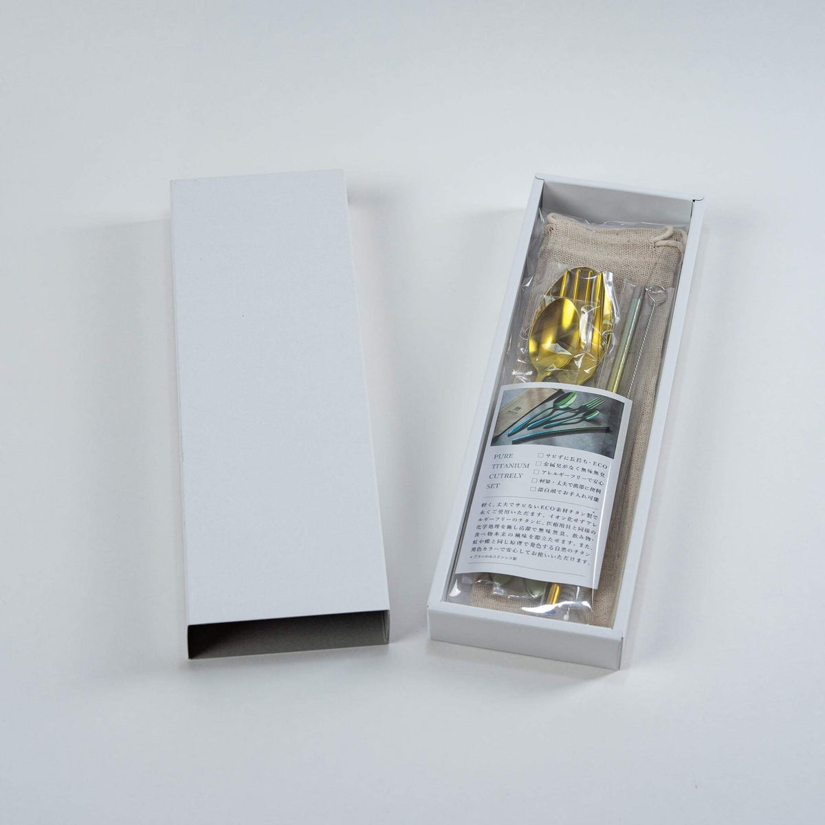 HORIE gold pure titanium cutlery set presented in its paper gift box